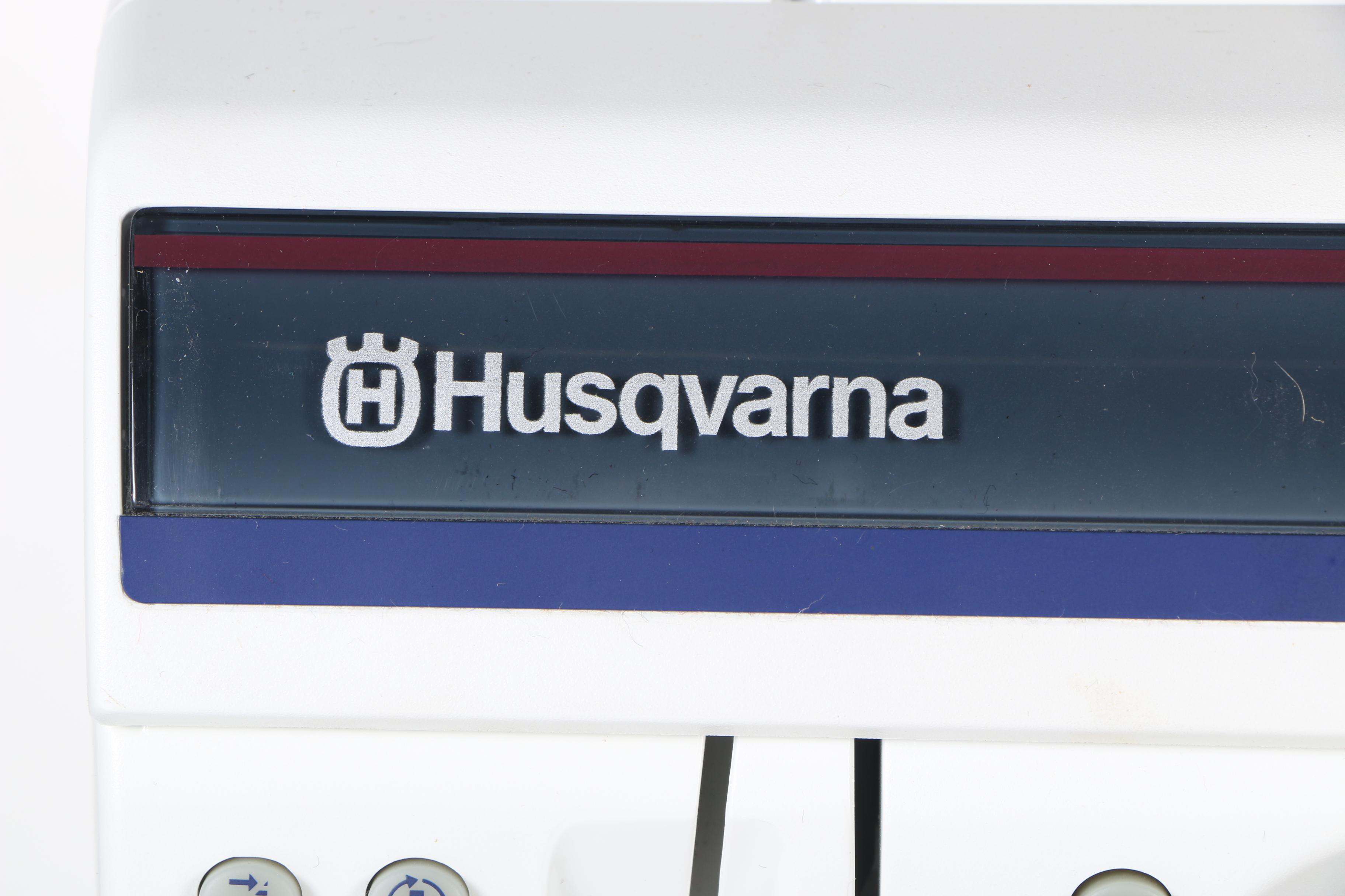 Two Husqvarna Viking Designer II Computerized Sewing Machines