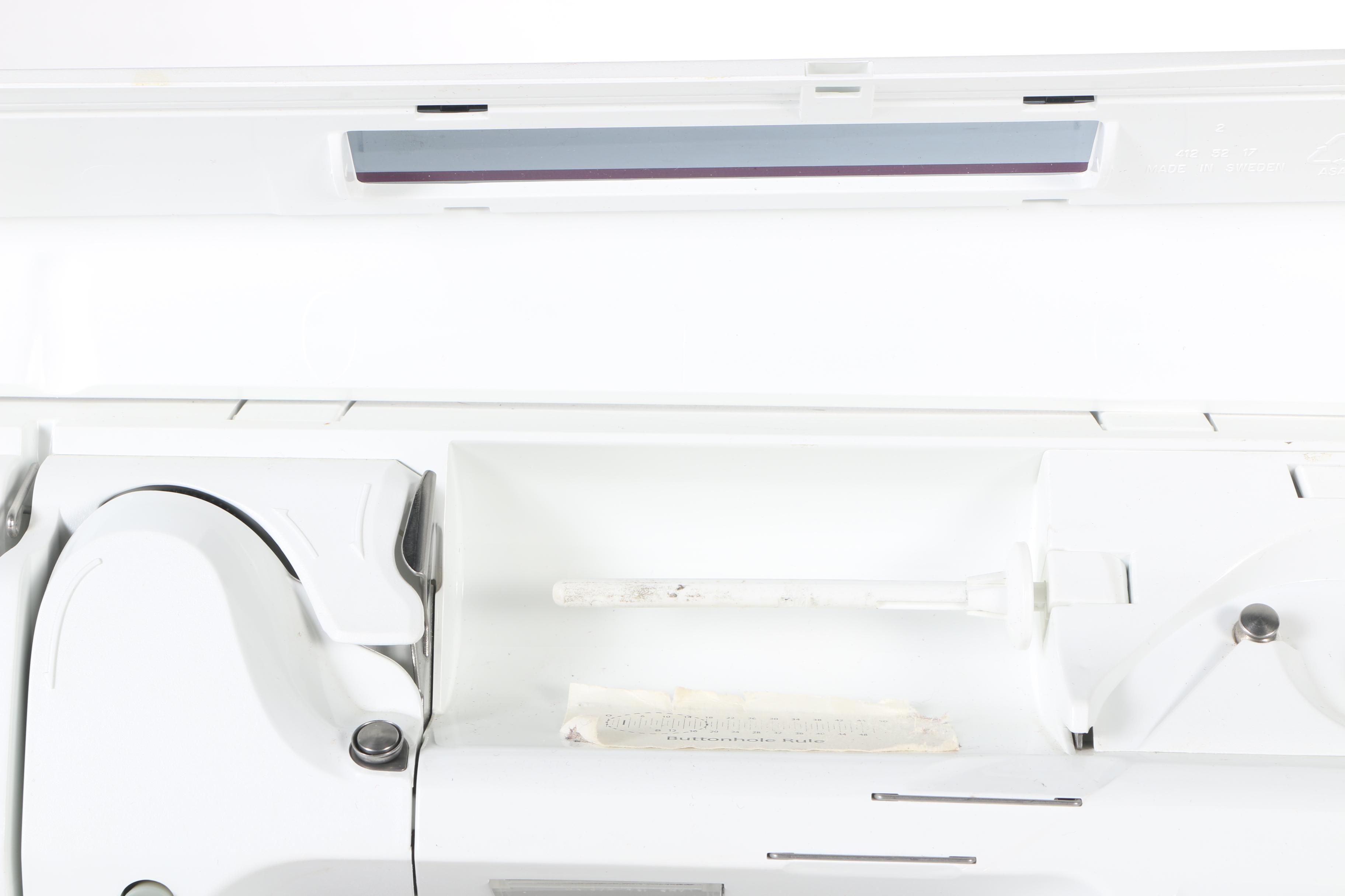 Two Husqvarna Viking Designer II Computerized Sewing Machines