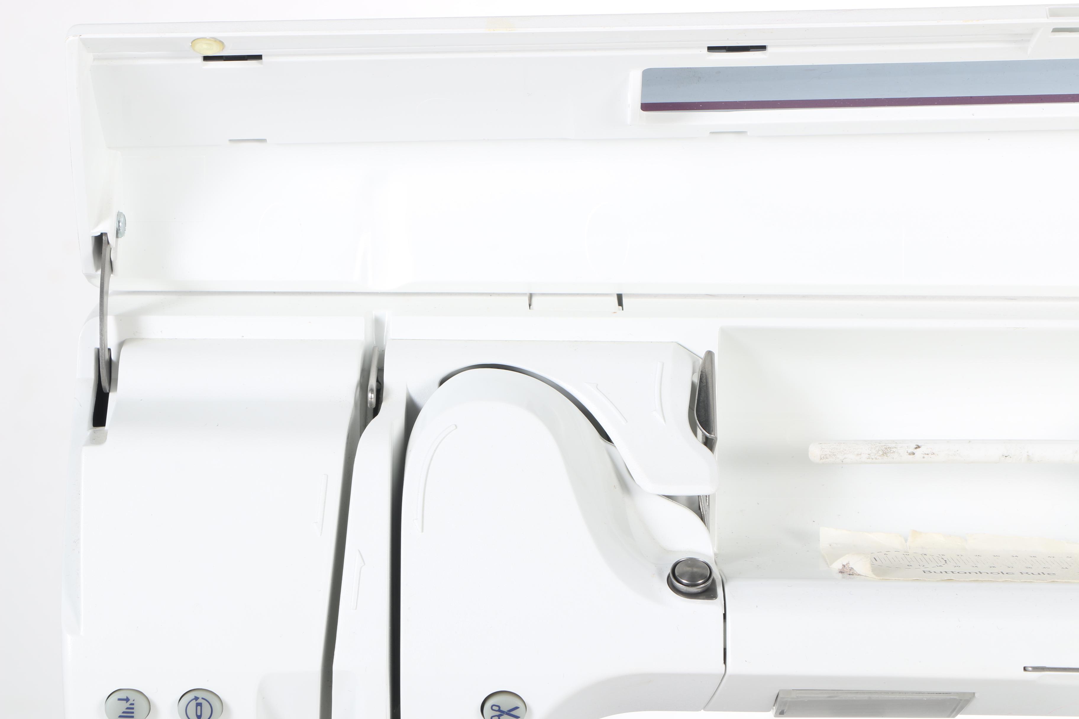 Two Husqvarna Viking Designer II Computerized Sewing Machines