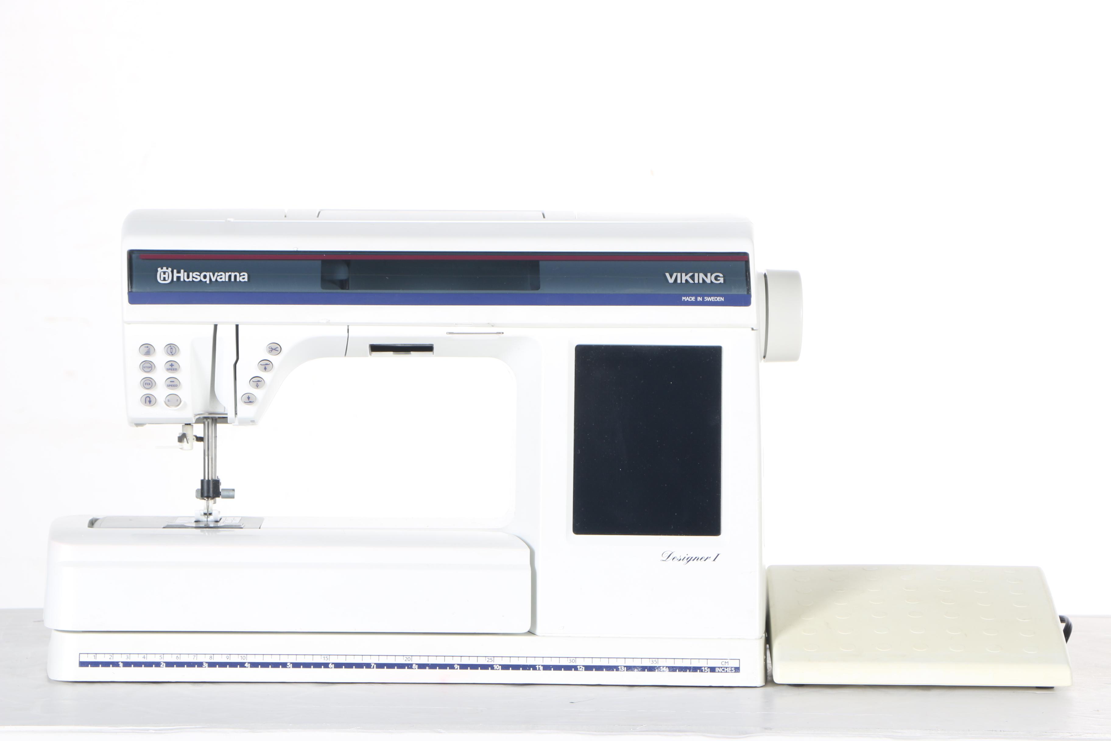 Two Husqvarna Viking Designer II Computerized Sewing Machines