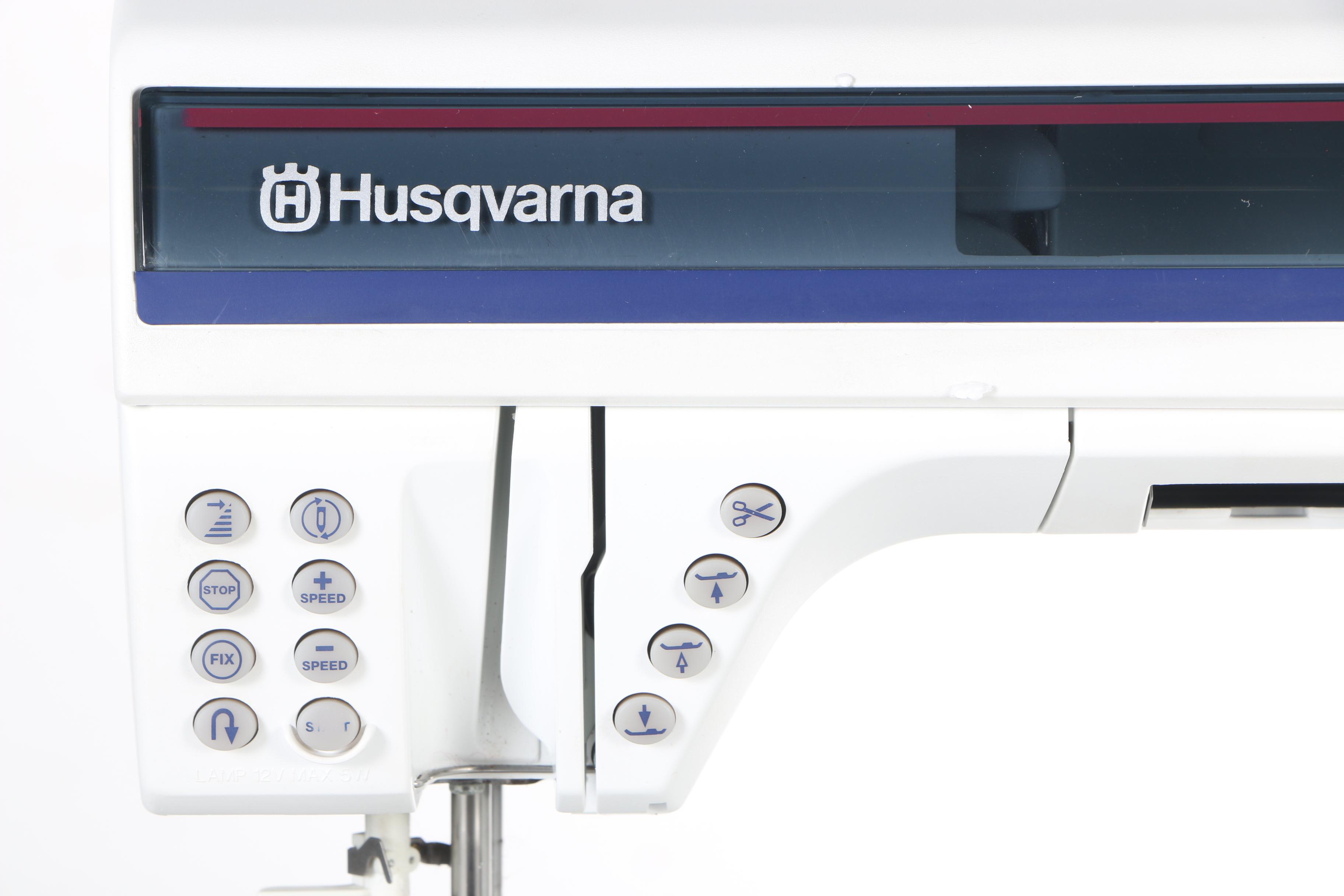 Two Husqvarna Viking Designer II Computerized Sewing Machines