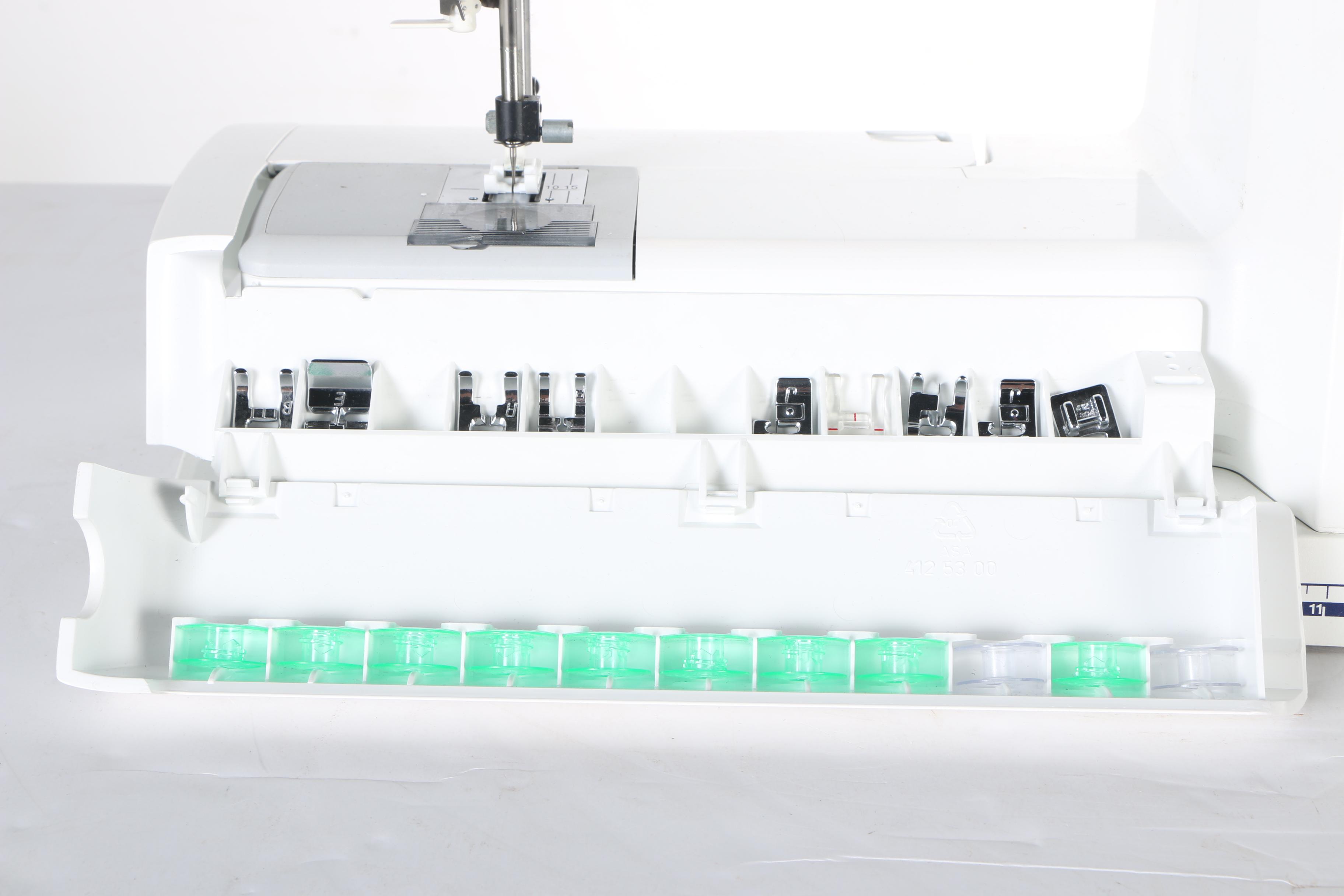 Two Husqvarna Viking Designer II Computerized Sewing Machines