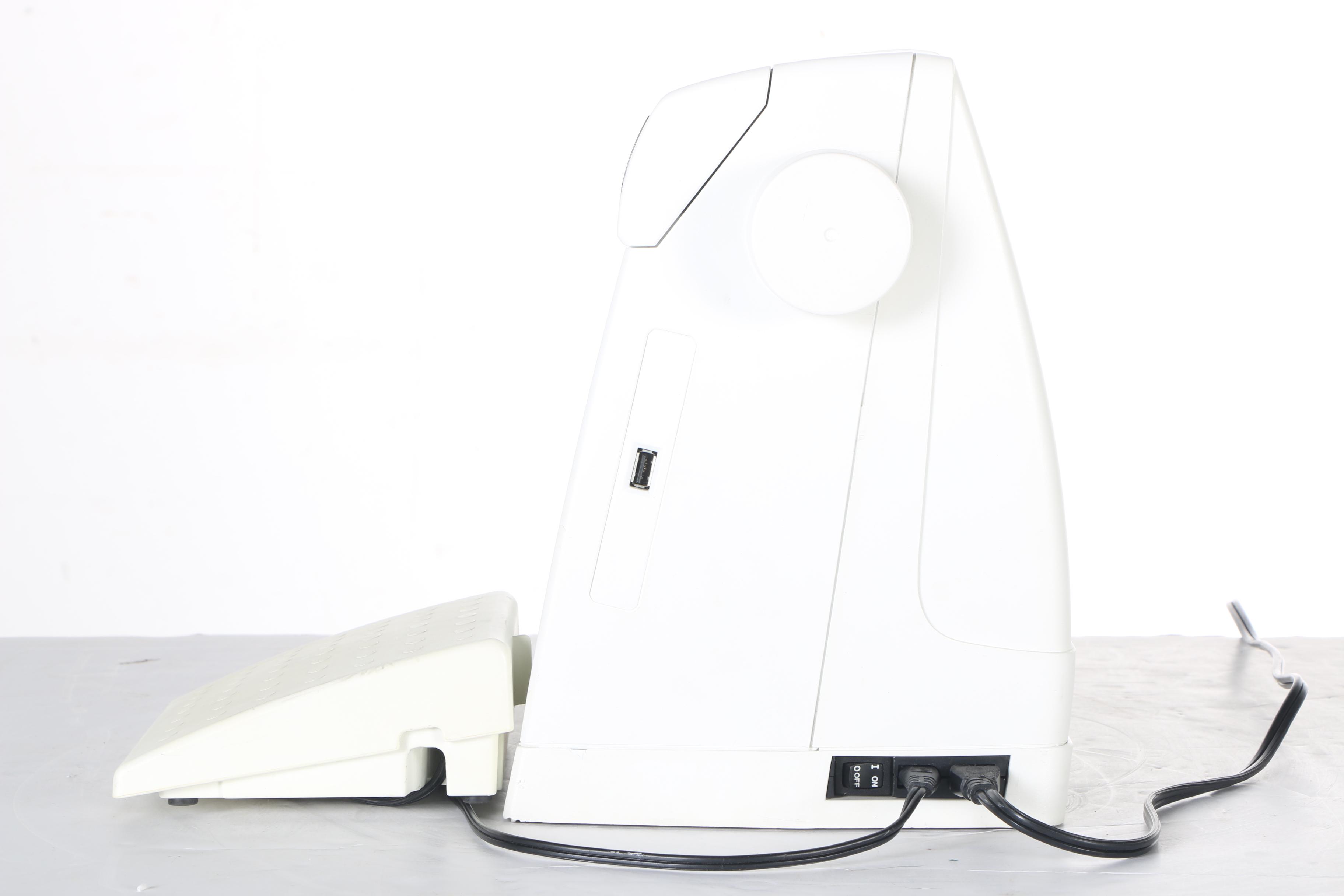 Two Husqvarna Viking Designer II Computerized Sewing Machines