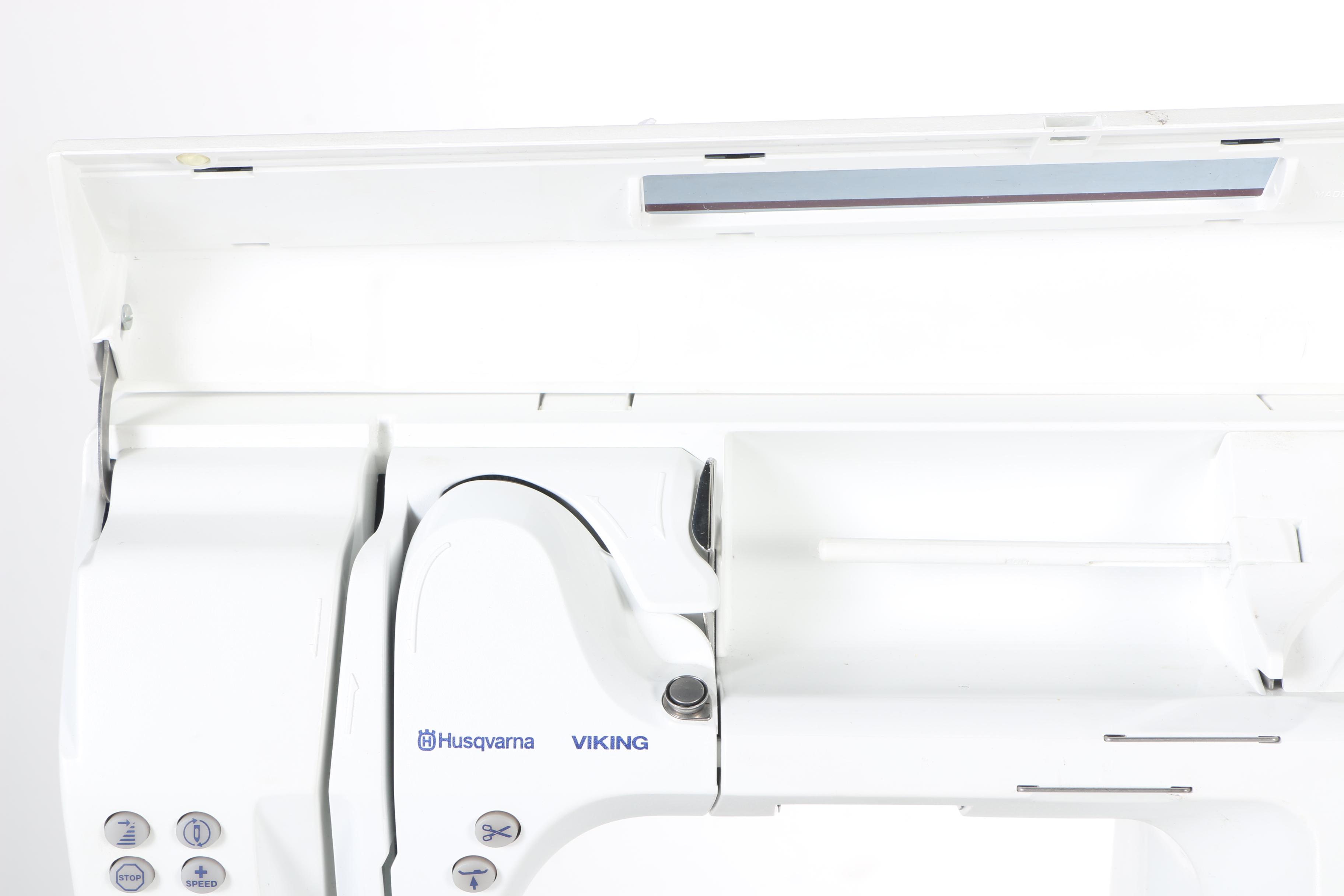 Two Husqvarna Viking Designer II Computerized Sewing Machines