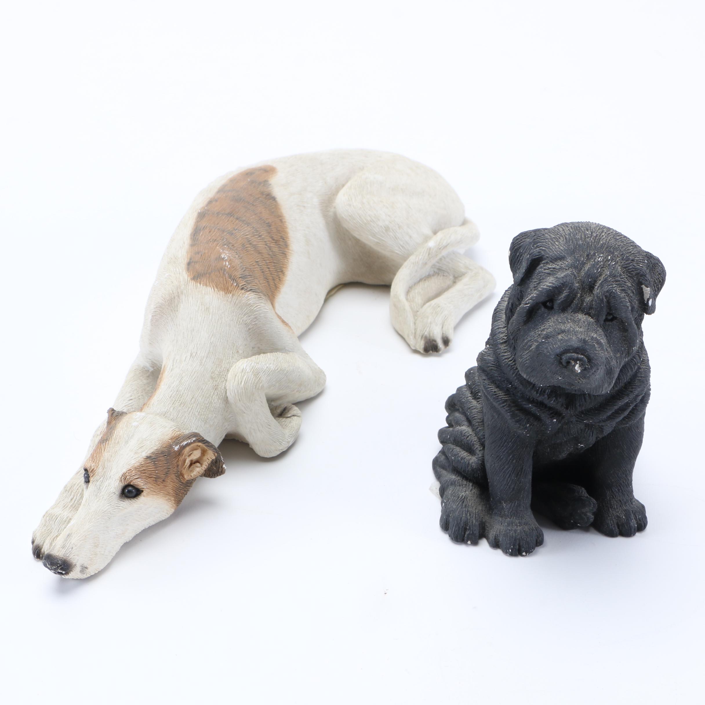 Pair of Sandicast Figurines