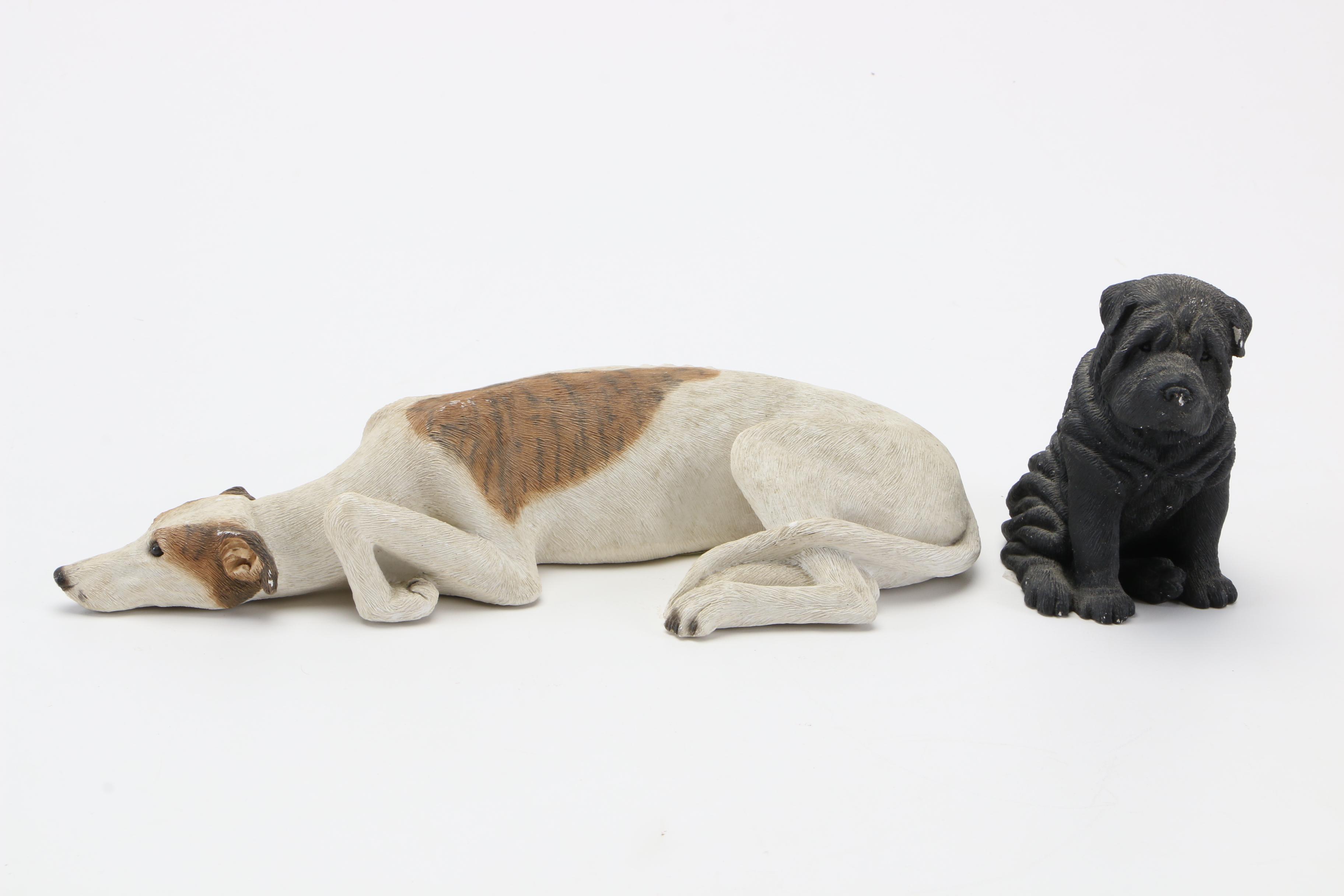 Pair of Sandicast Figurines