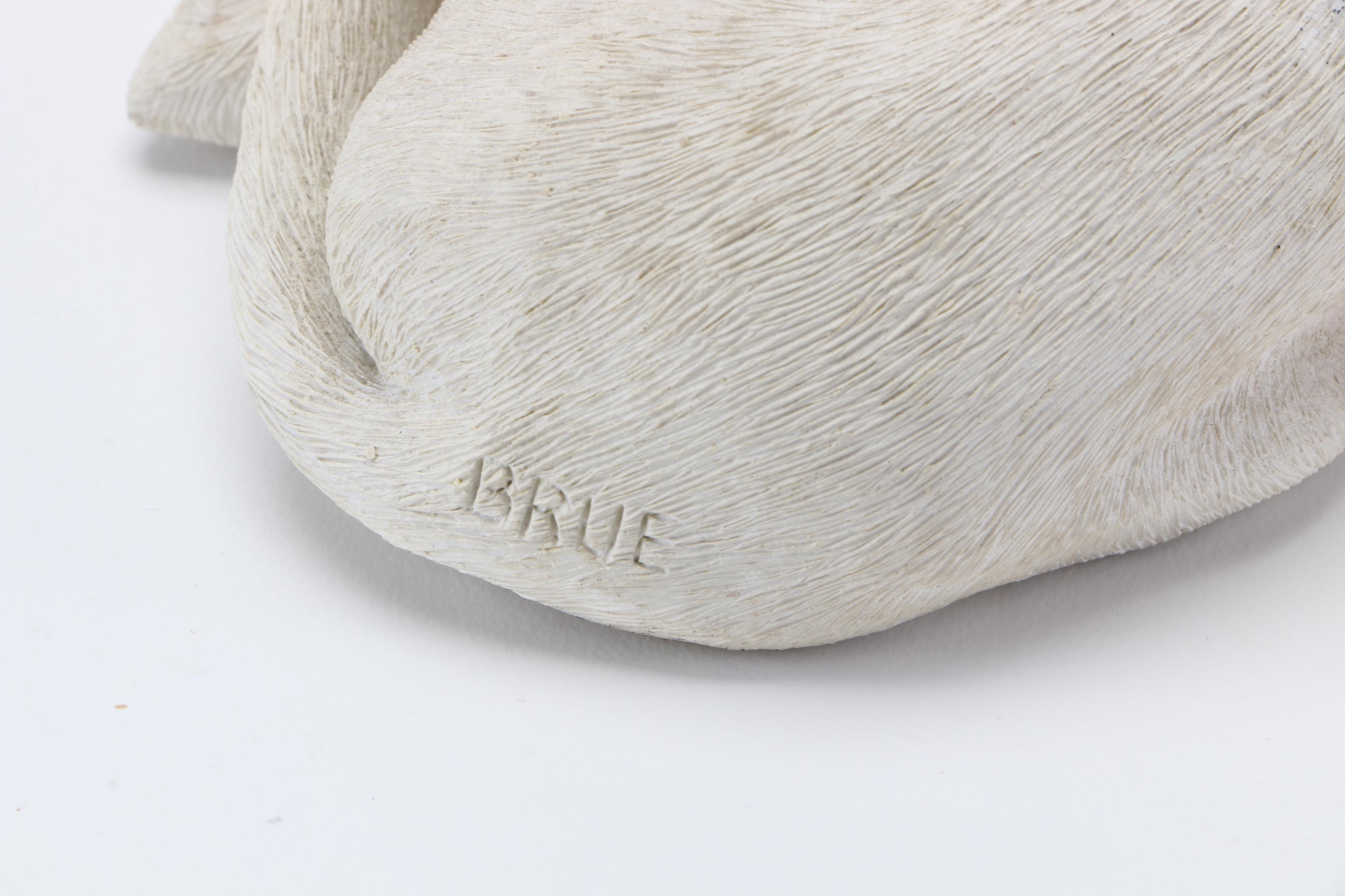 Pair of Sandicast Figurines