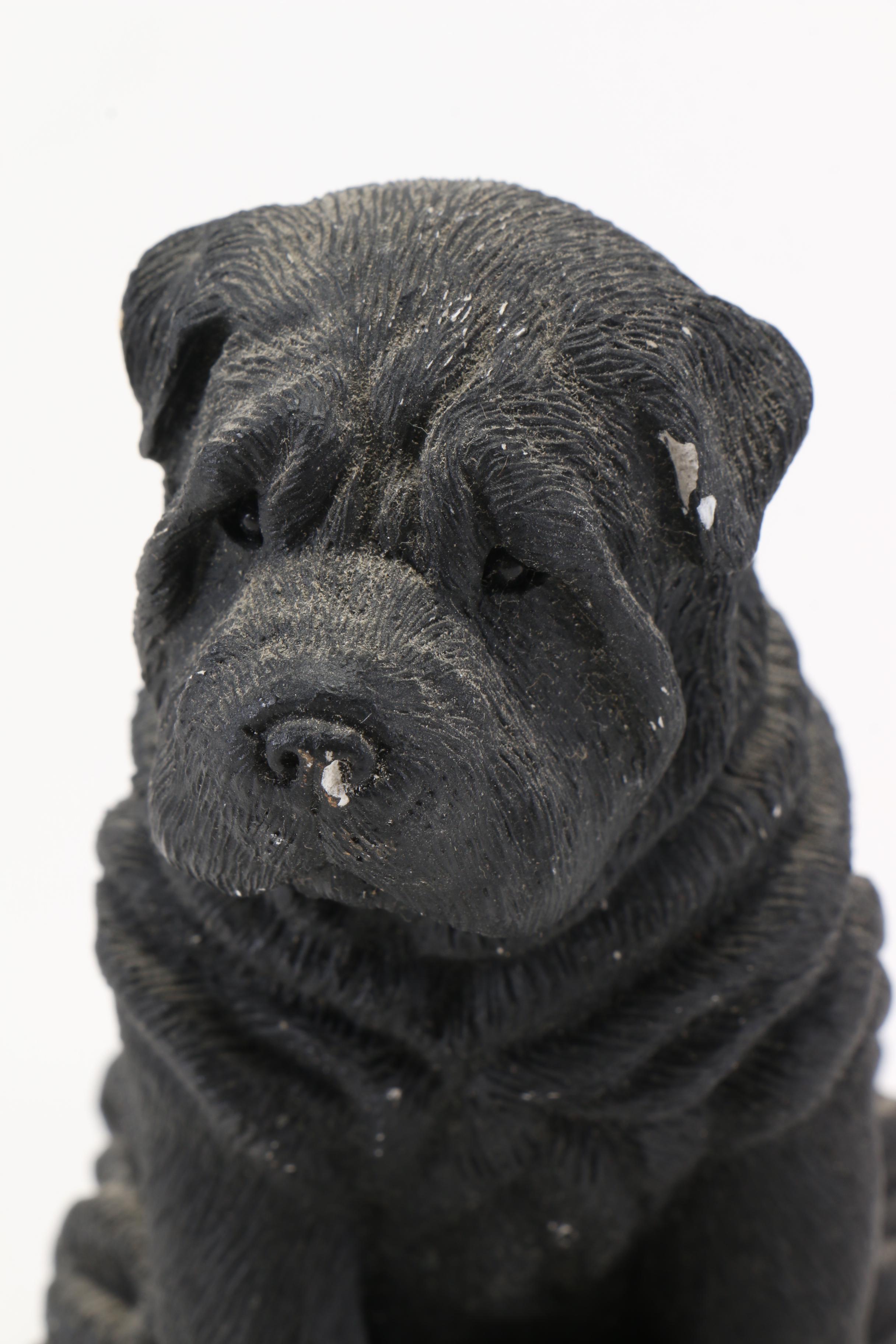 Pair of Sandicast Figurines