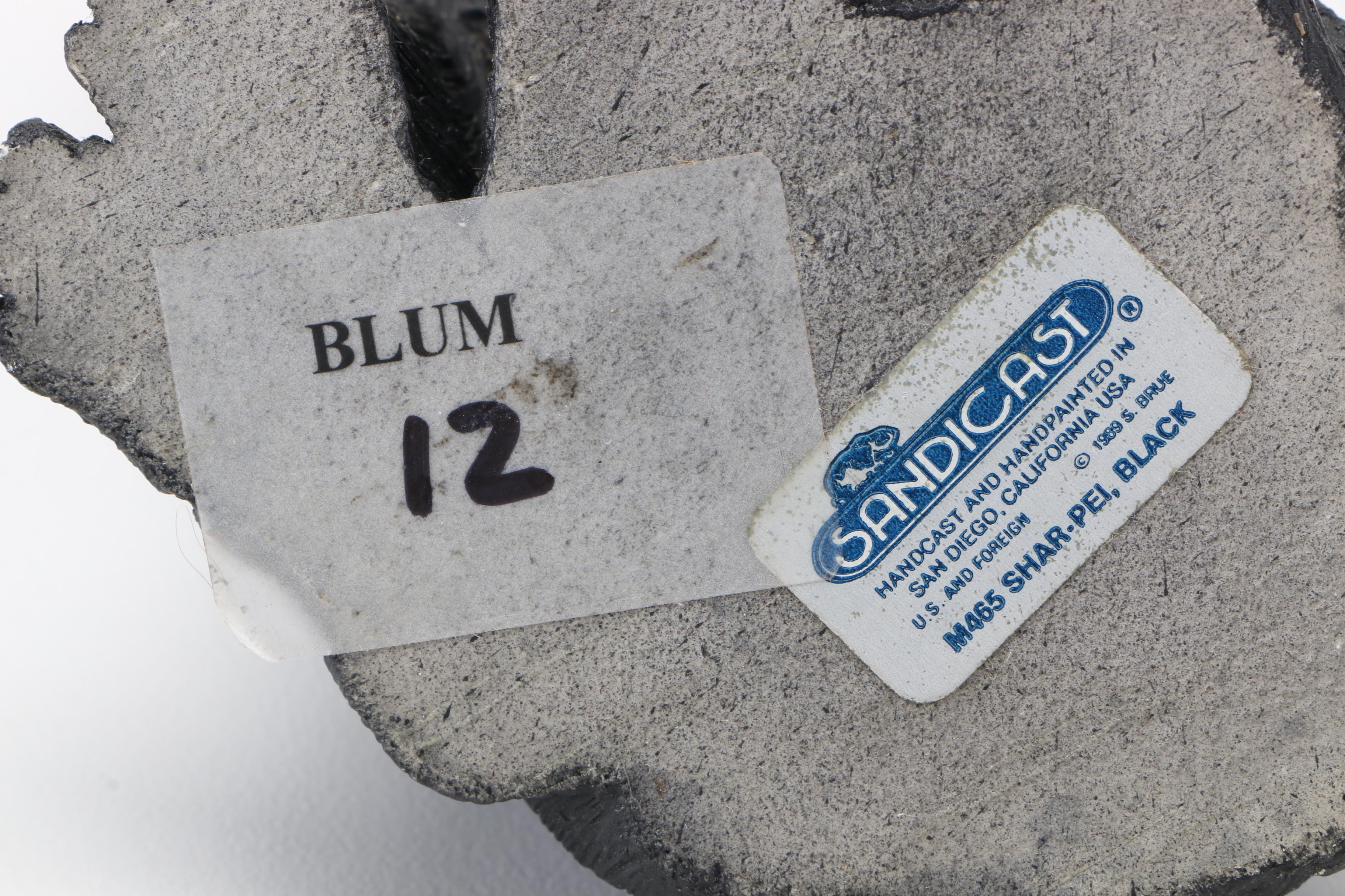 Pair of Sandicast Figurines