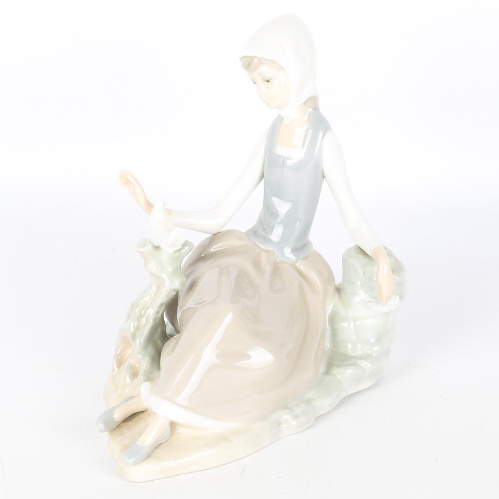 Lladro Woman with Dove Figurine