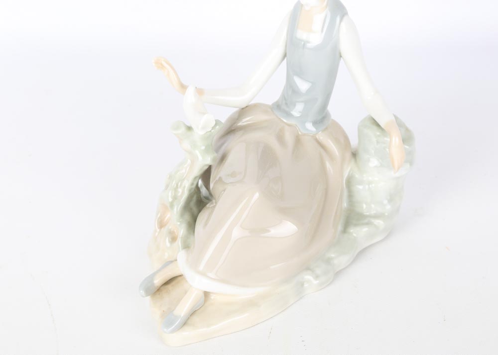 Lladro Woman with Dove Figurine