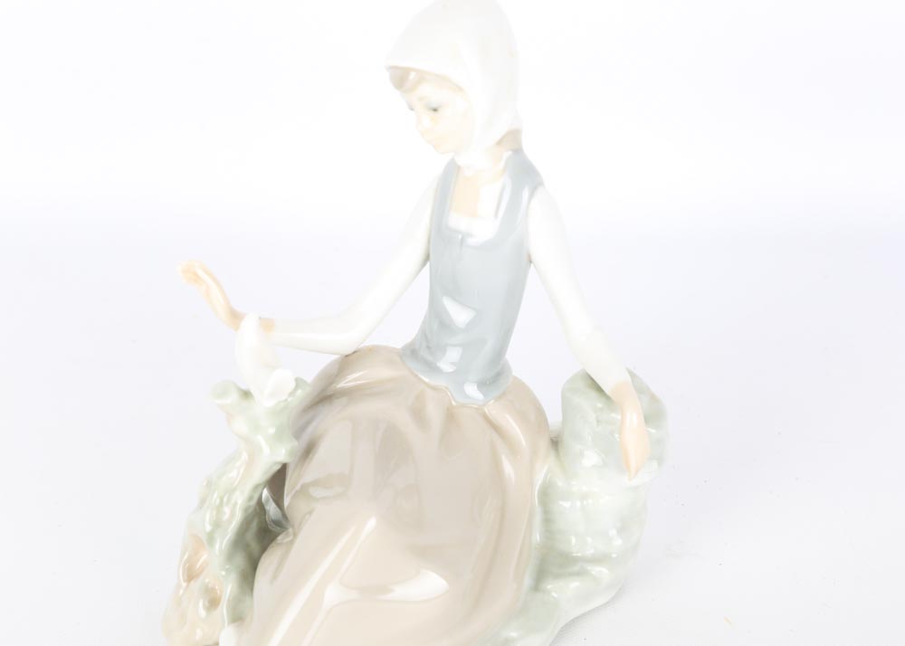 Lladro Woman with Dove Figurine