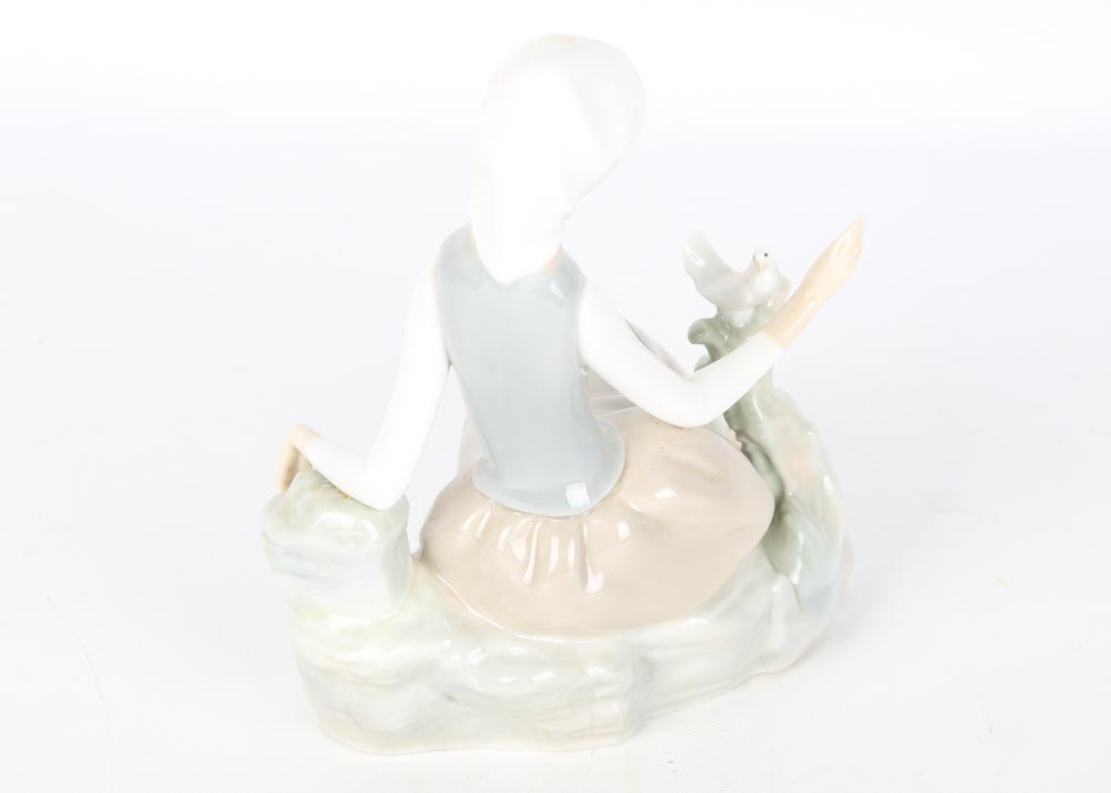 Lladro Woman with Dove Figurine