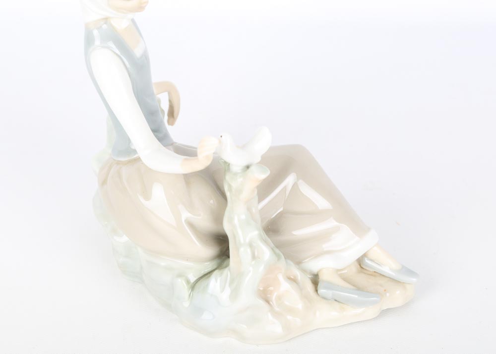 Lladro Woman with Dove Figurine