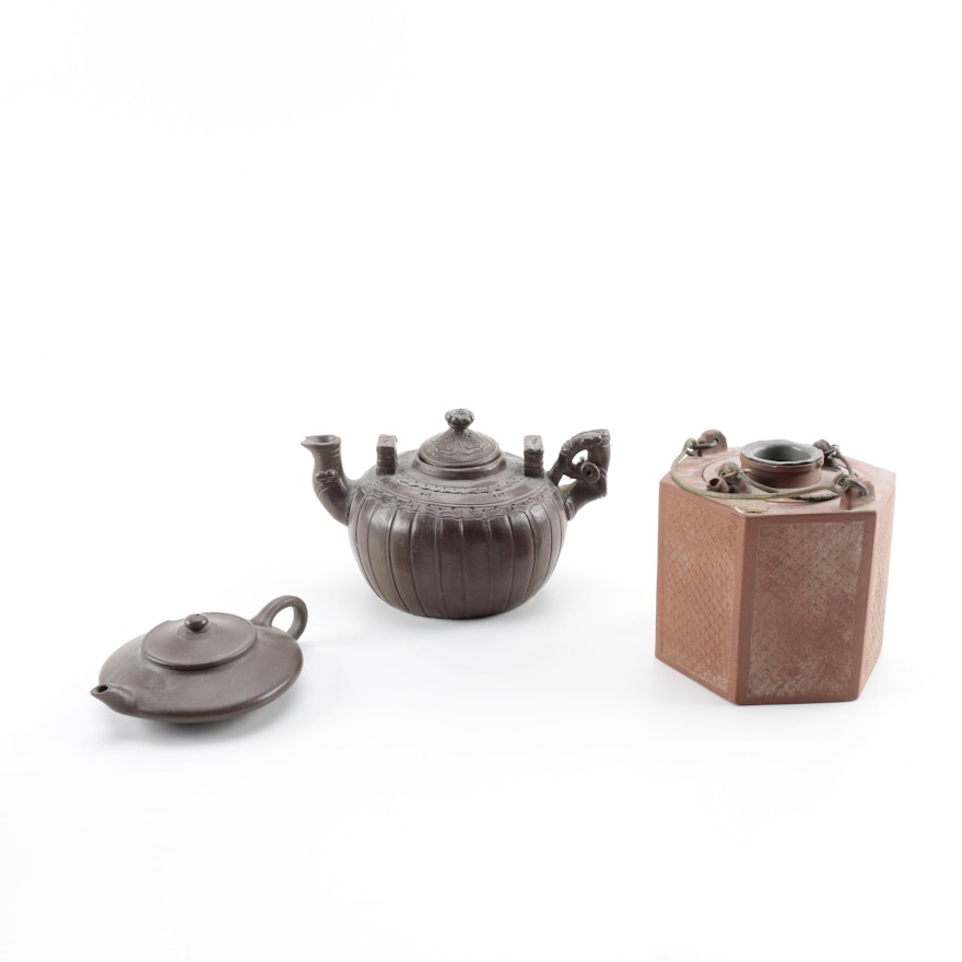 Assorted East Asian Teapots Including Yixing Teapot