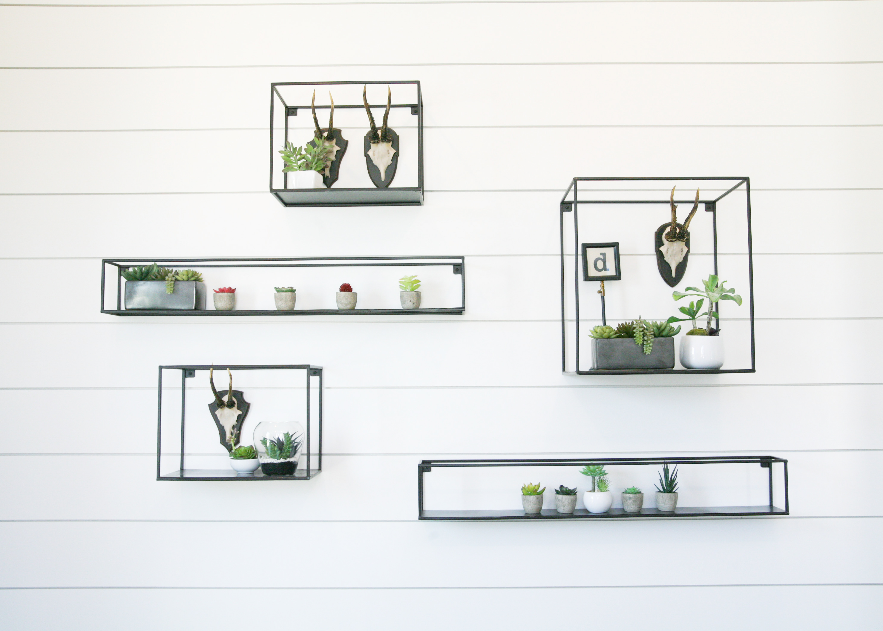 Collection of Metal Shelving With Various Home Decor