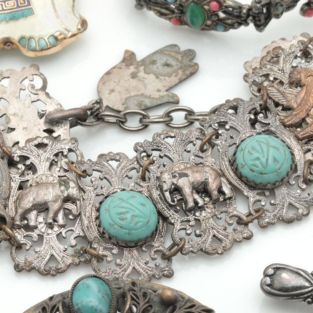 Assortment of Costume Jewelry Including Two Sterling Silver Charms