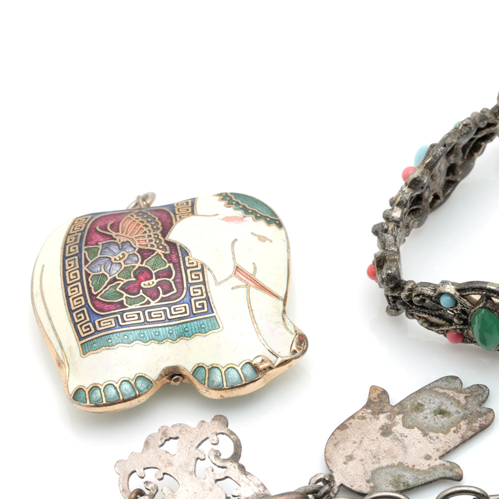 Assortment of Costume Jewelry Including Two Sterling Silver Charms