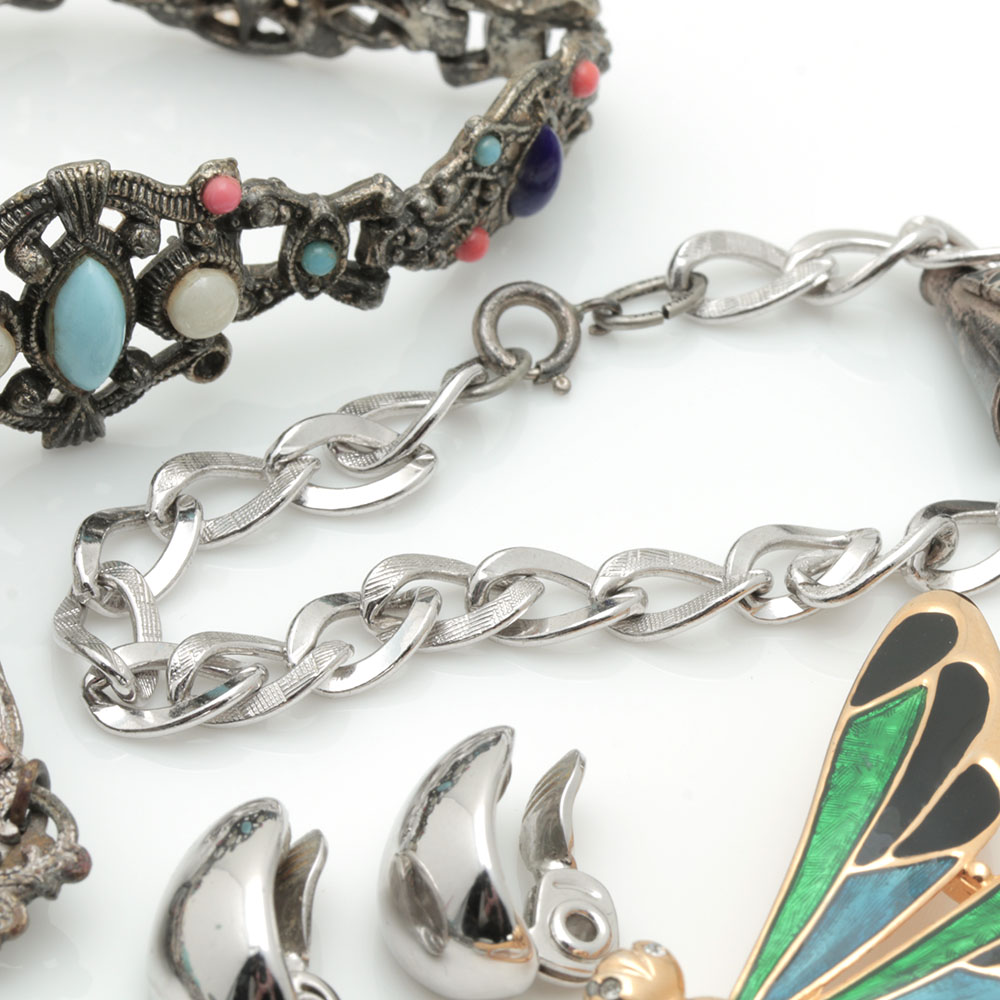 Assortment of Costume Jewelry Including Two Sterling Silver Charms