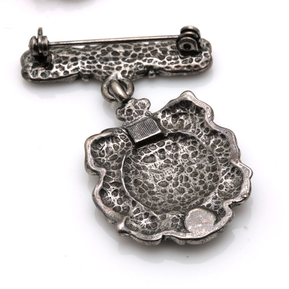 Assortment of Costume Jewelry Including Two Sterling Silver Charms