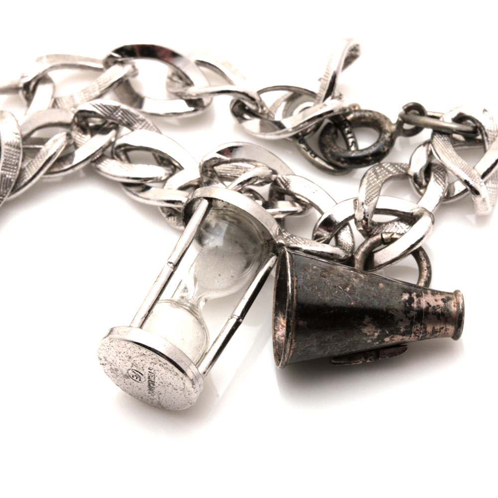 Assortment of Costume Jewelry Including Two Sterling Silver Charms