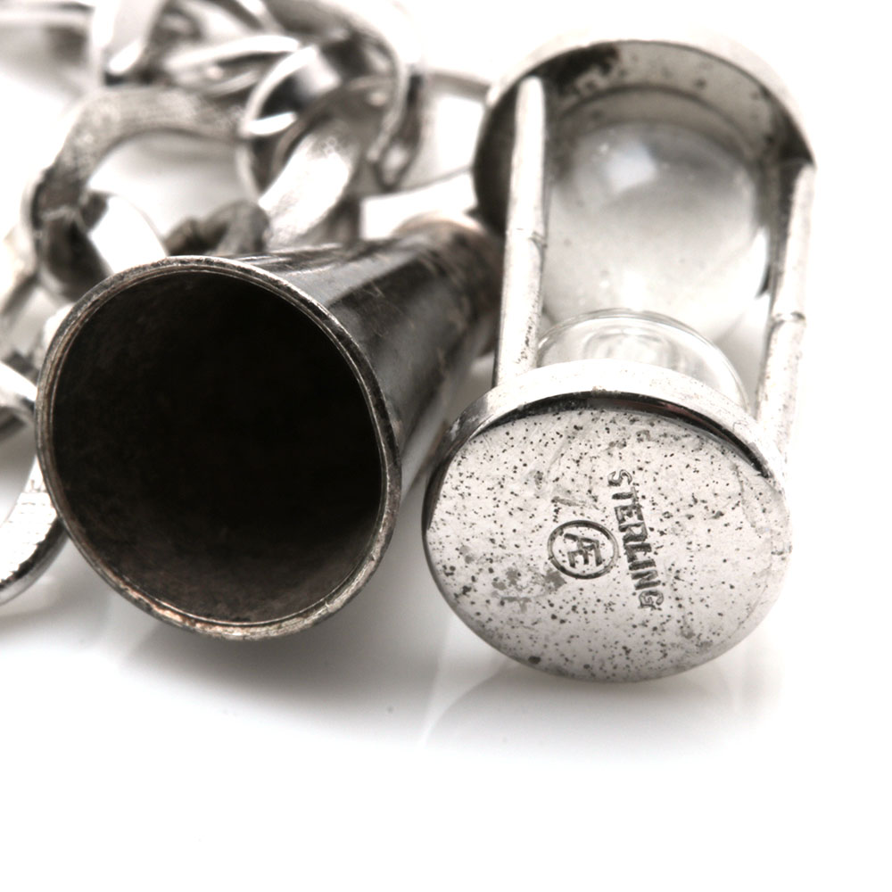 Assortment of Costume Jewelry Including Two Sterling Silver Charms