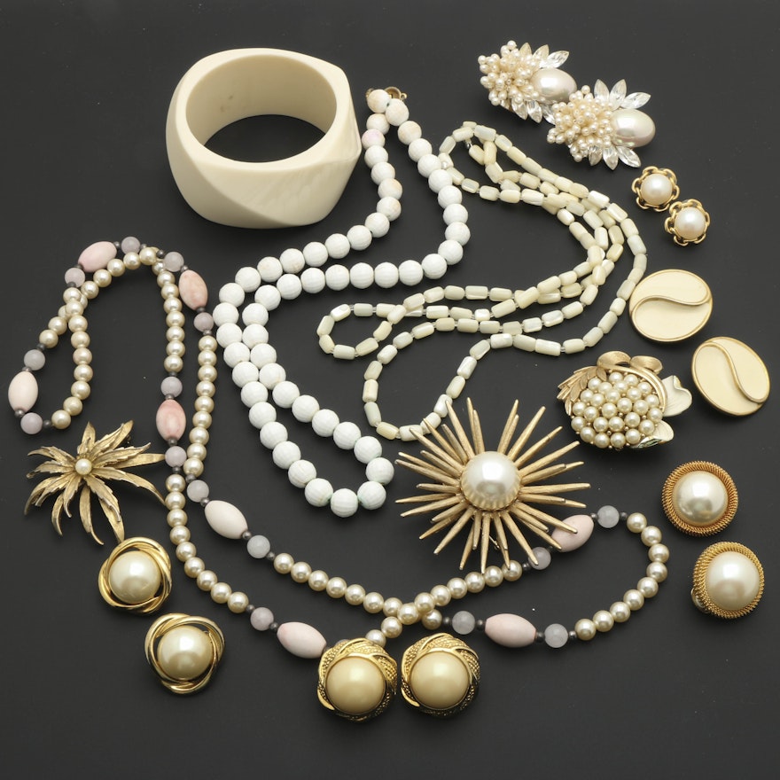 Assortment of White and Gold Tone Jewelry