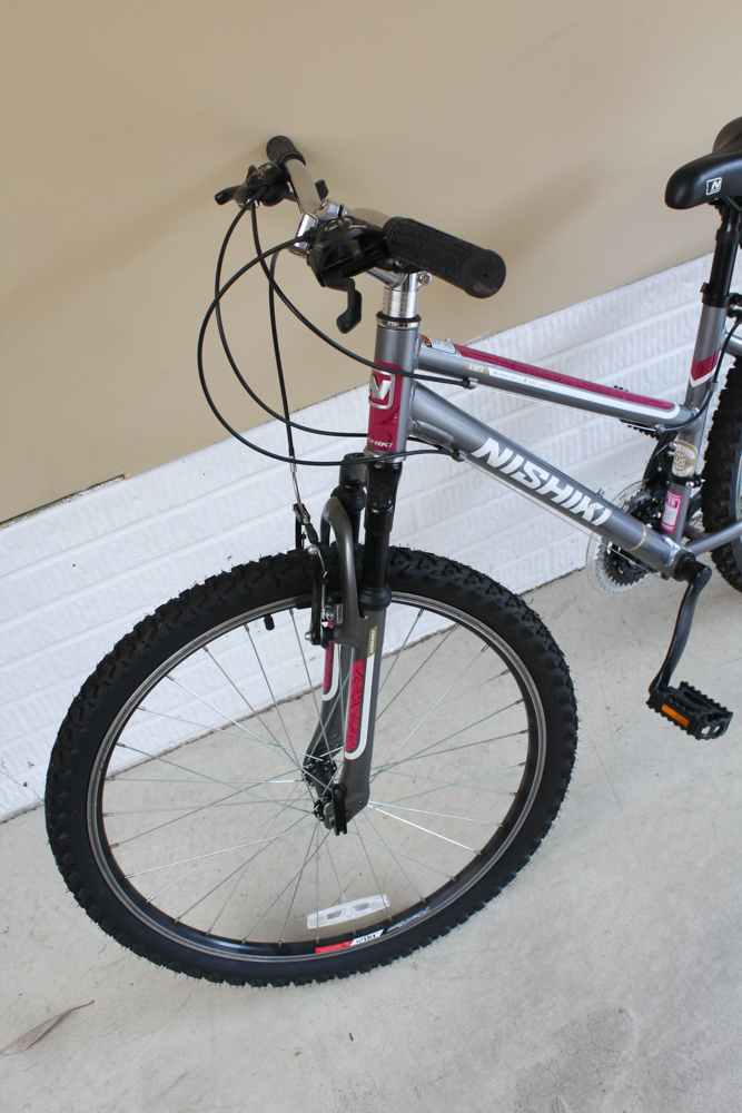 Two Mountain Bicycles by Nishiki and Diamondback