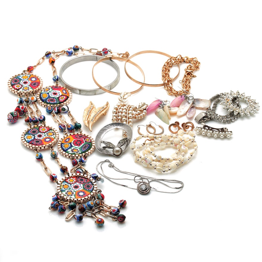 Colorful Assortment of Jewelry Featuring Sterling Silver, Shell, Rhinestones, and Imitation Millefiori