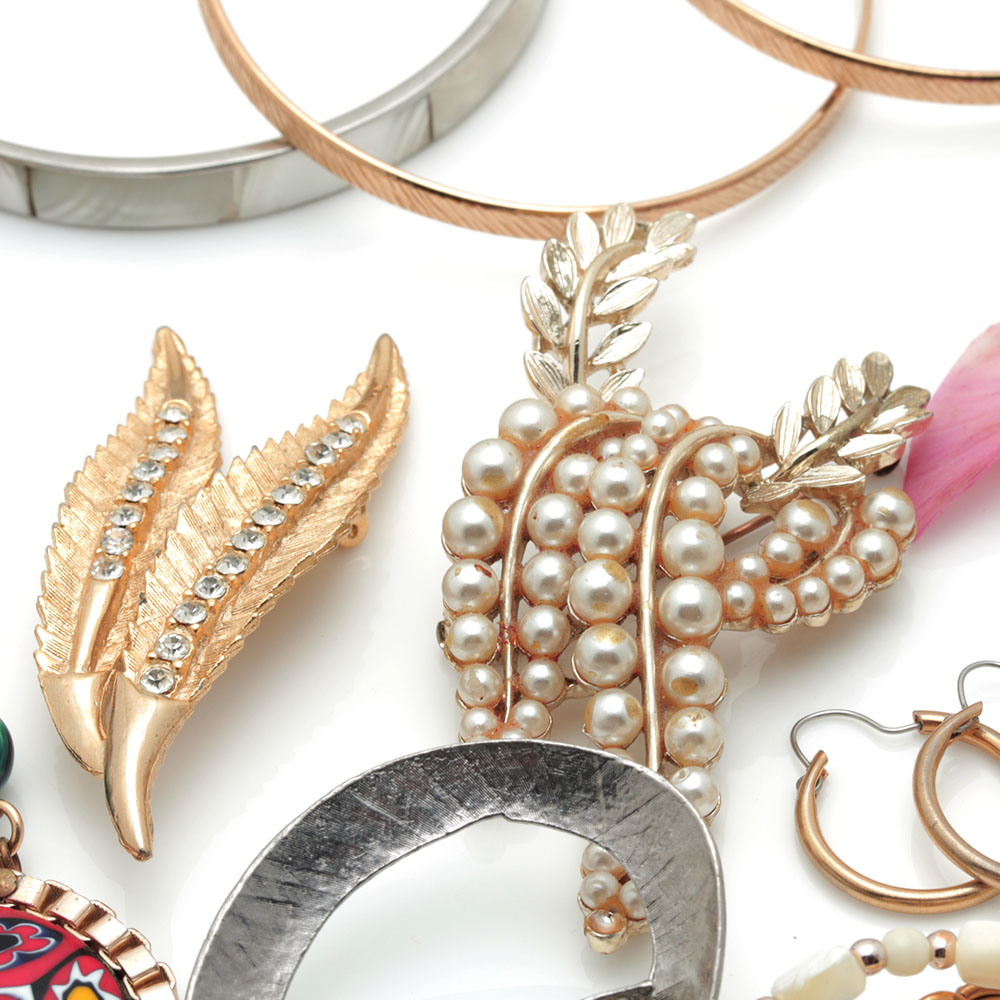 Colorful Assortment of Jewelry Featuring Sterling Silver, Shell, Rhinestones, and Imitation Millefiori