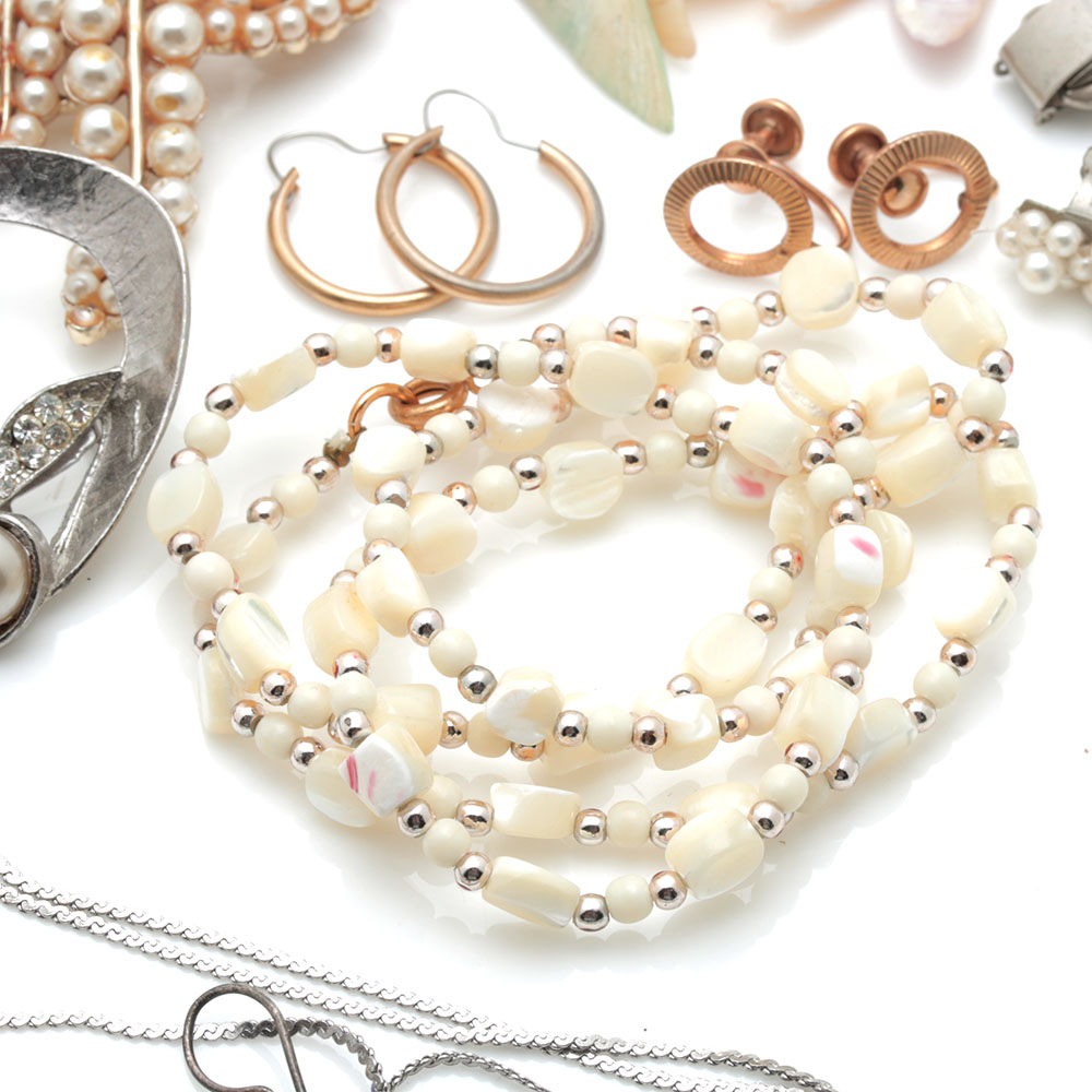 Colorful Assortment of Jewelry Featuring Sterling Silver, Shell, Rhinestones, and Imitation Millefiori