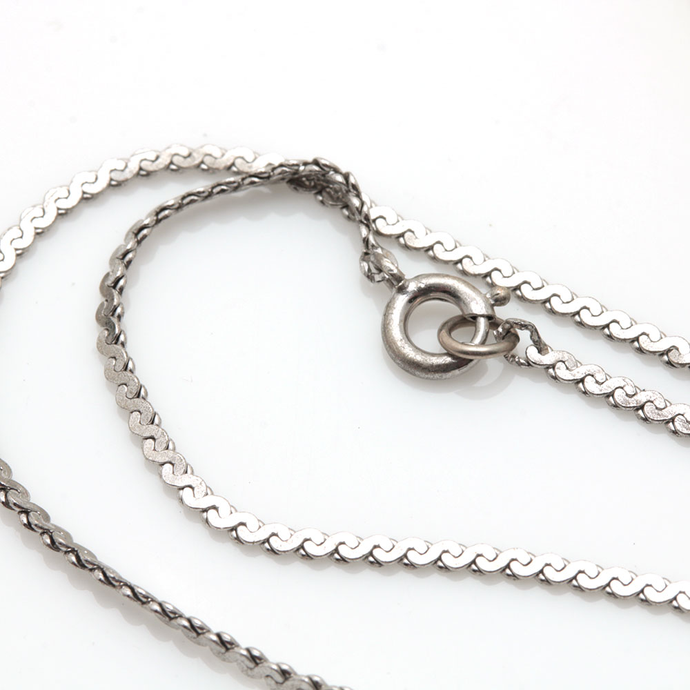 Colorful Assortment of Jewelry Featuring Sterling Silver, Shell, Rhinestones, and Imitation Millefiori