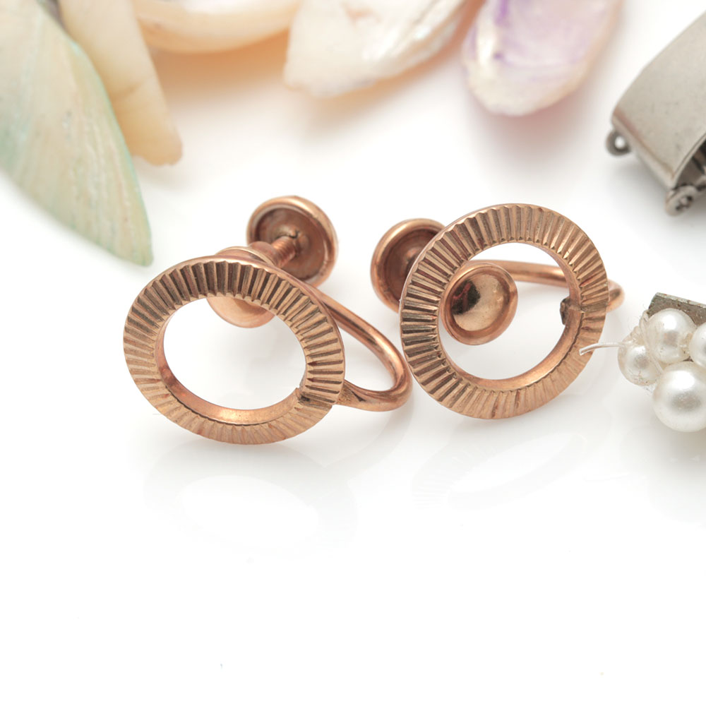 Colorful Assortment of Jewelry Featuring Sterling Silver, Shell, Rhinestones, and Imitation Millefiori