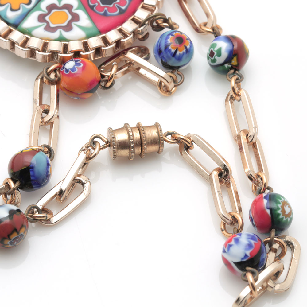 Colorful Assortment of Jewelry Featuring Sterling Silver, Shell, Rhinestones, and Imitation Millefiori