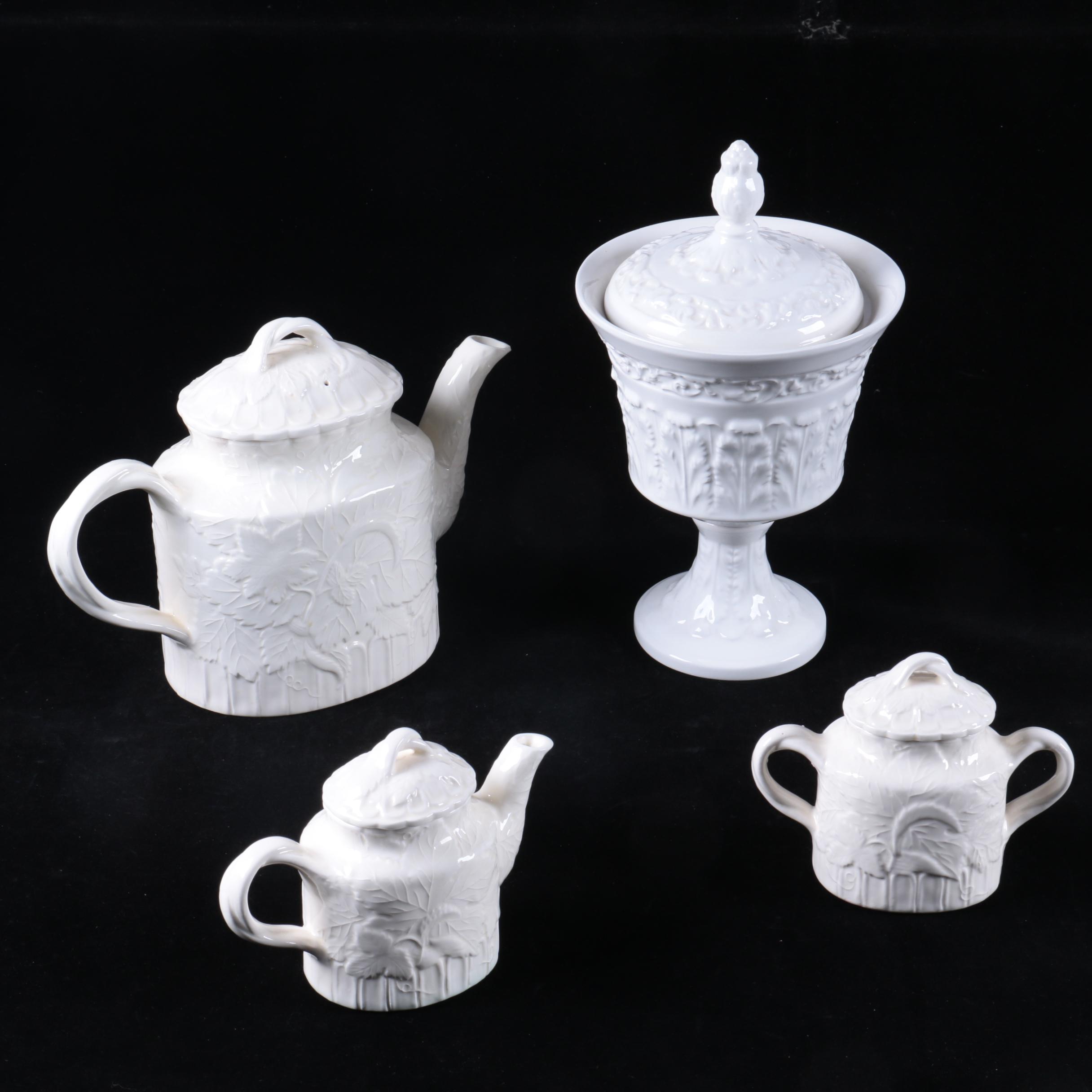 Four Pieces of Embossed White Ceramic Serveware