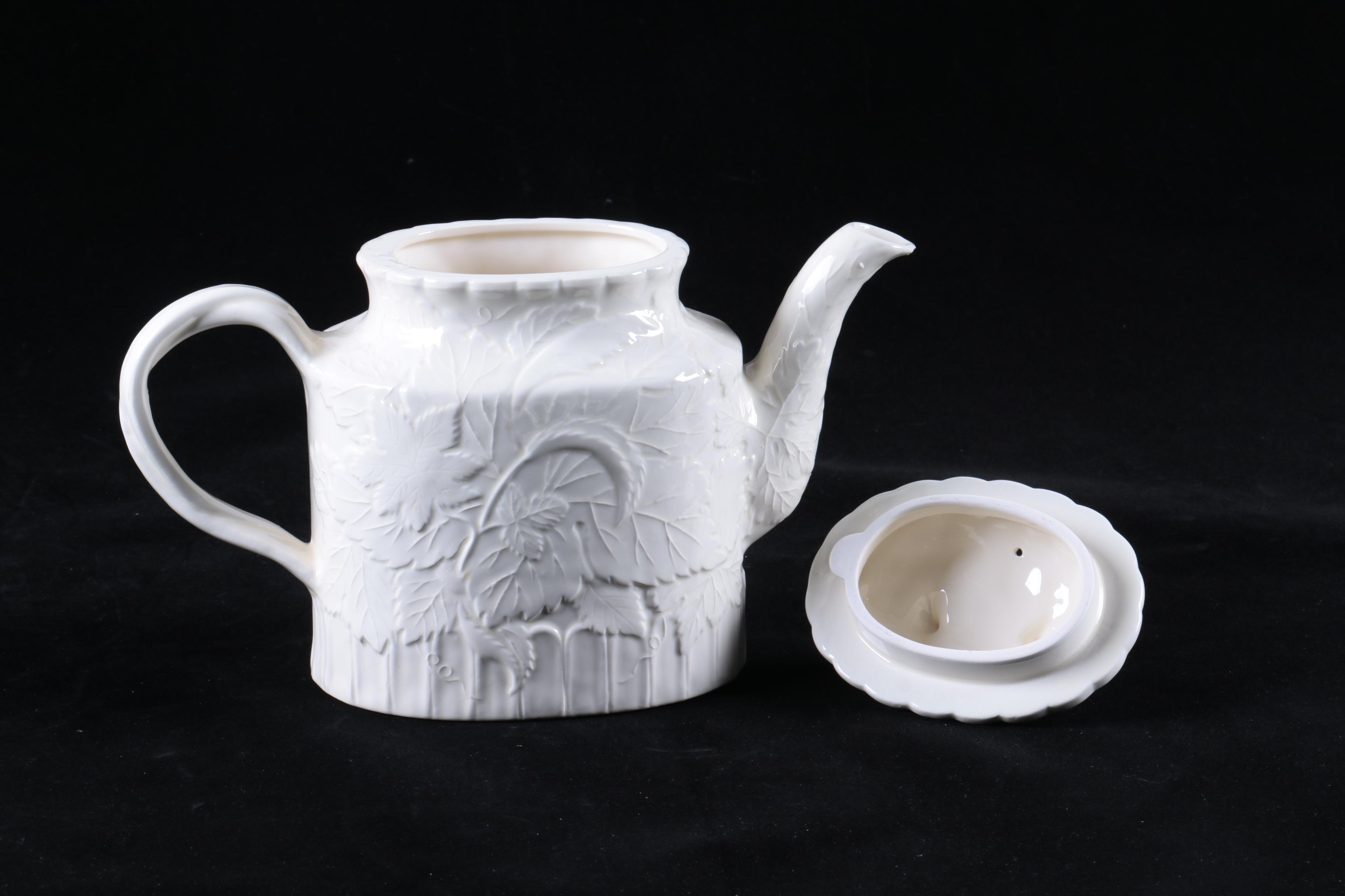 Four Pieces of Embossed White Ceramic Serveware