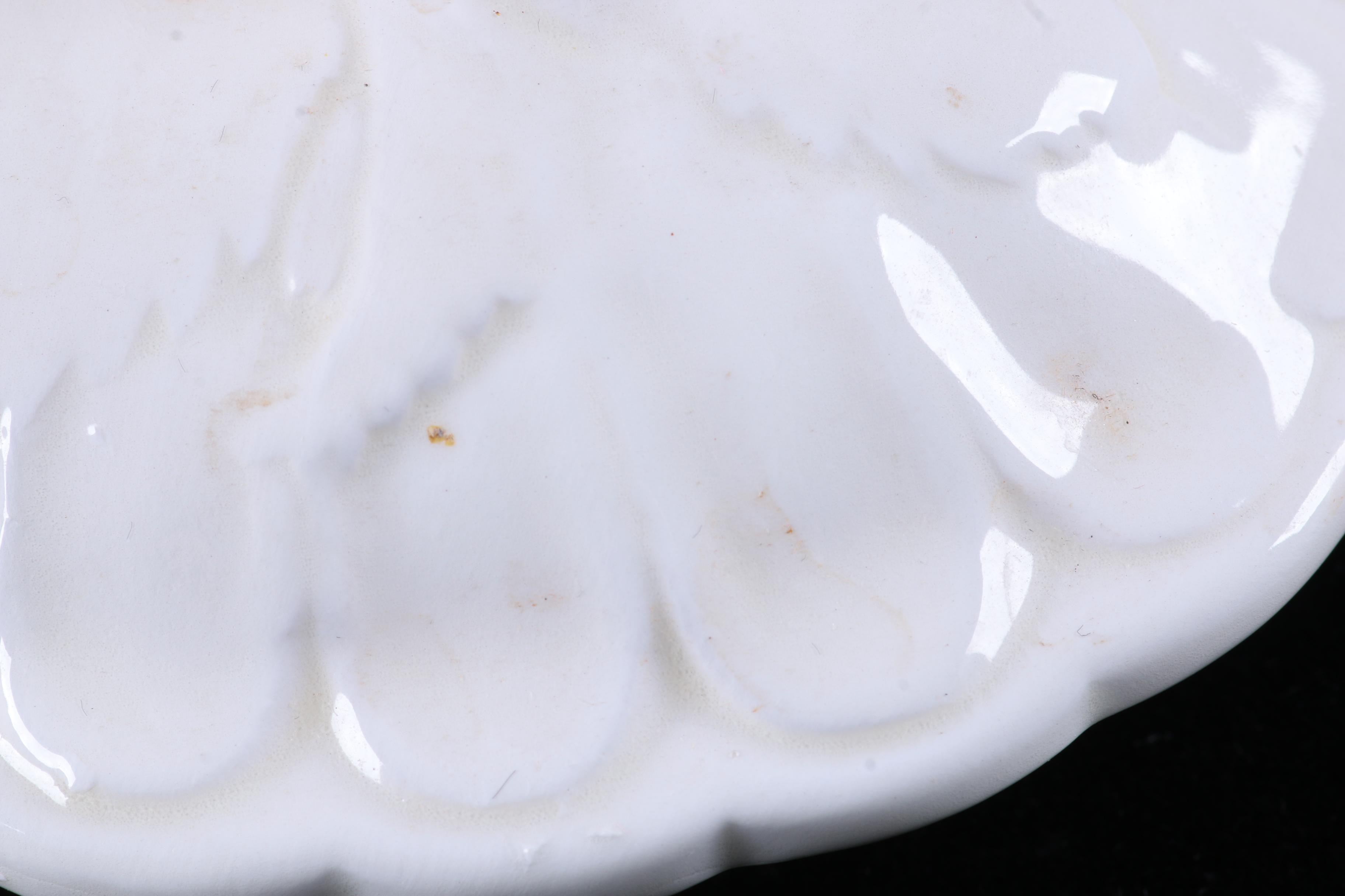 Four Pieces of Embossed White Ceramic Serveware