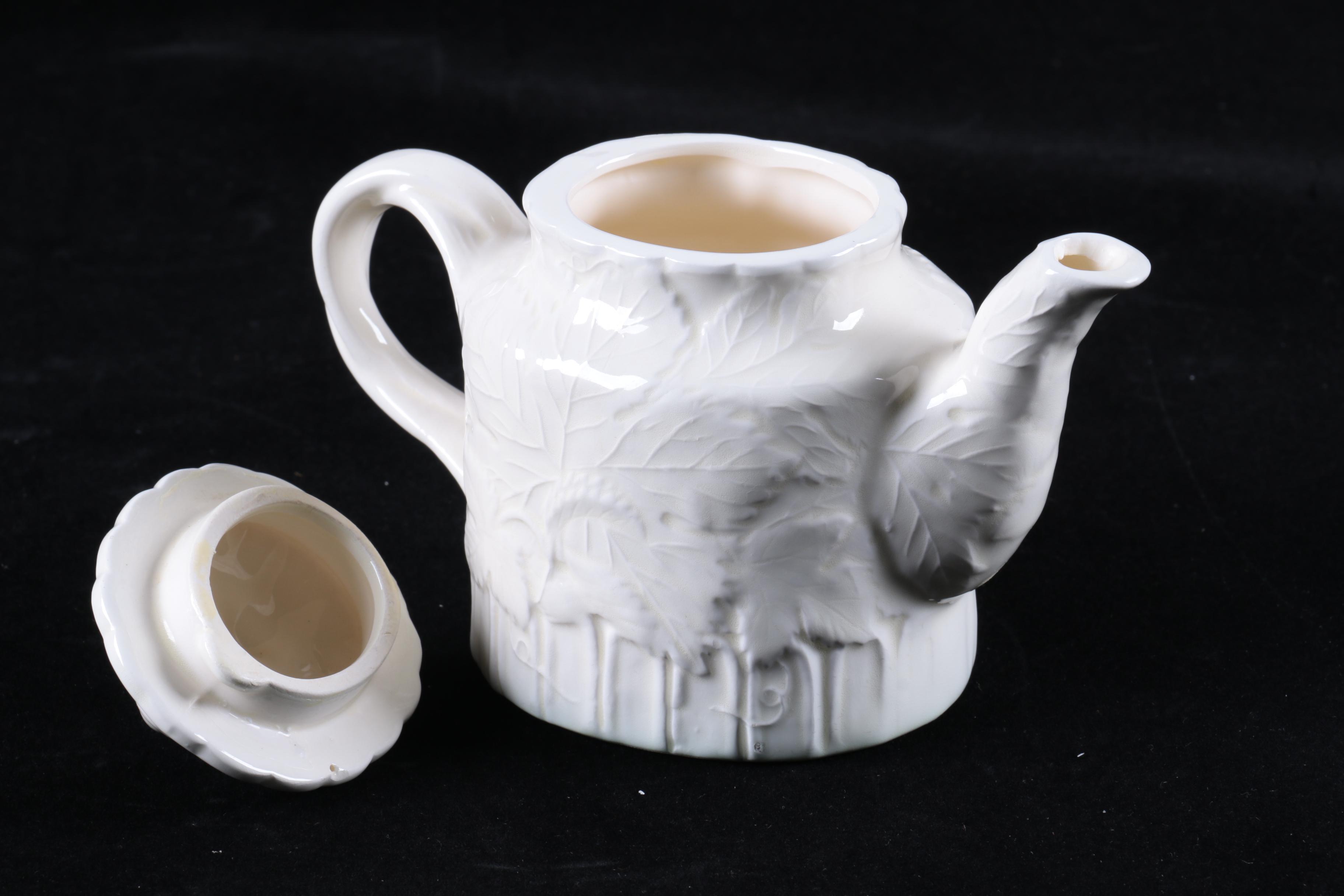 Four Pieces of Embossed White Ceramic Serveware