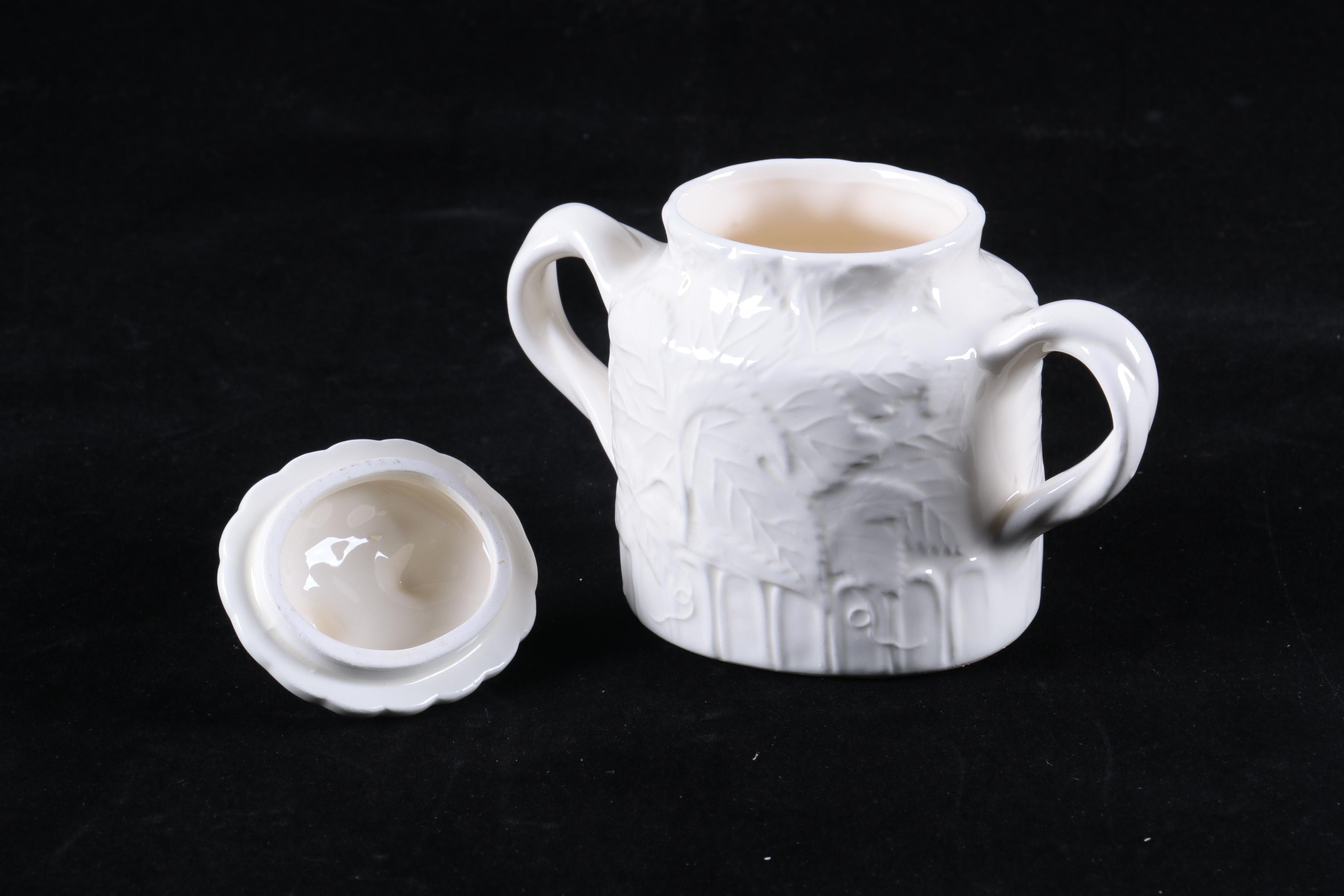 Four Pieces of Embossed White Ceramic Serveware