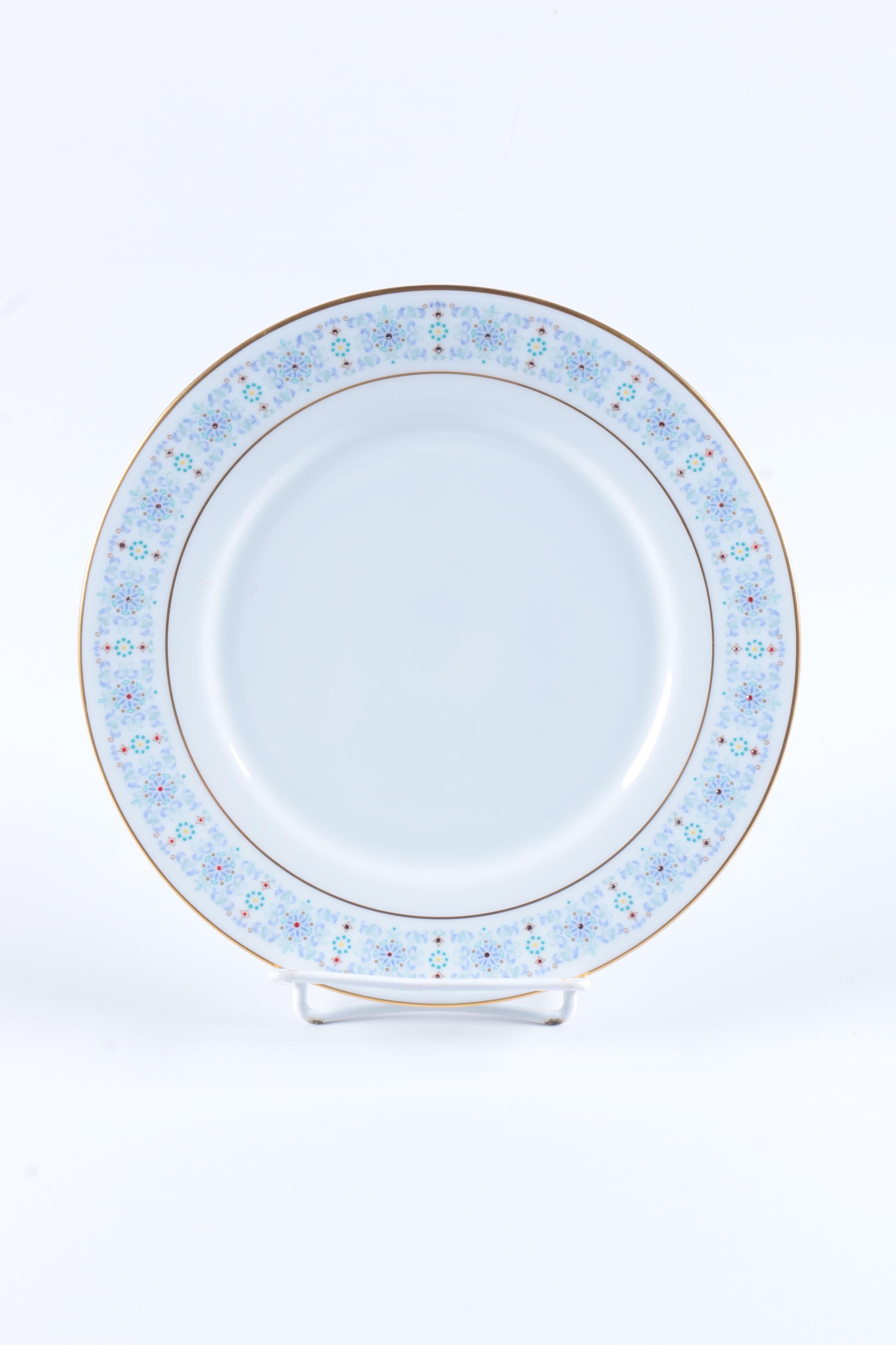 Assorted Gilt Rim Ceramic Plates featuring Ginori and Limoges