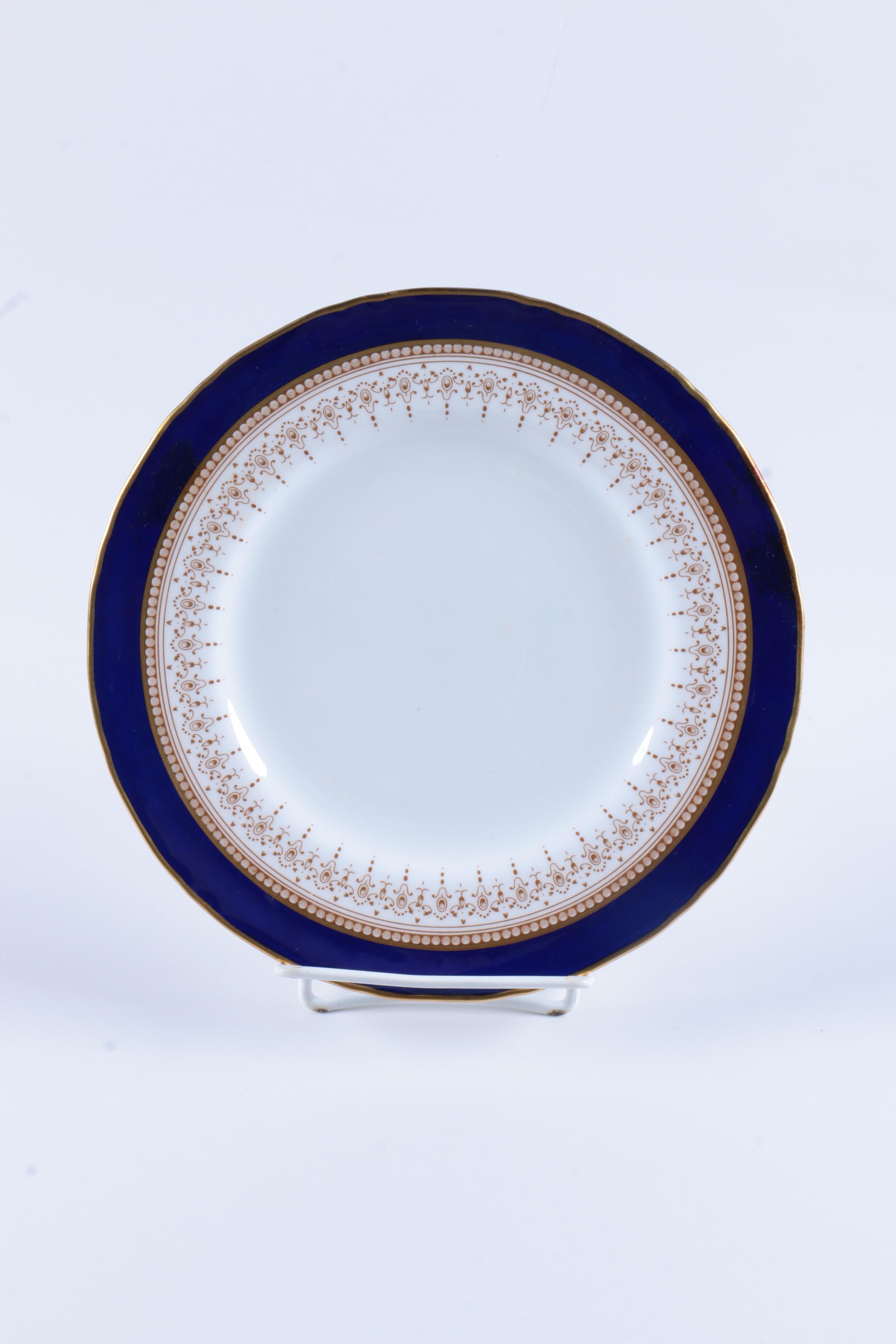 Assorted Gilt Rim Ceramic Plates featuring Ginori and Limoges
