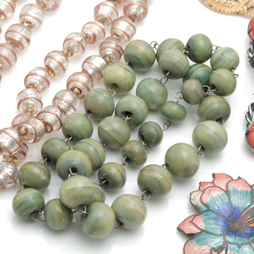 Assortment of Glass Necklaces and Brooches