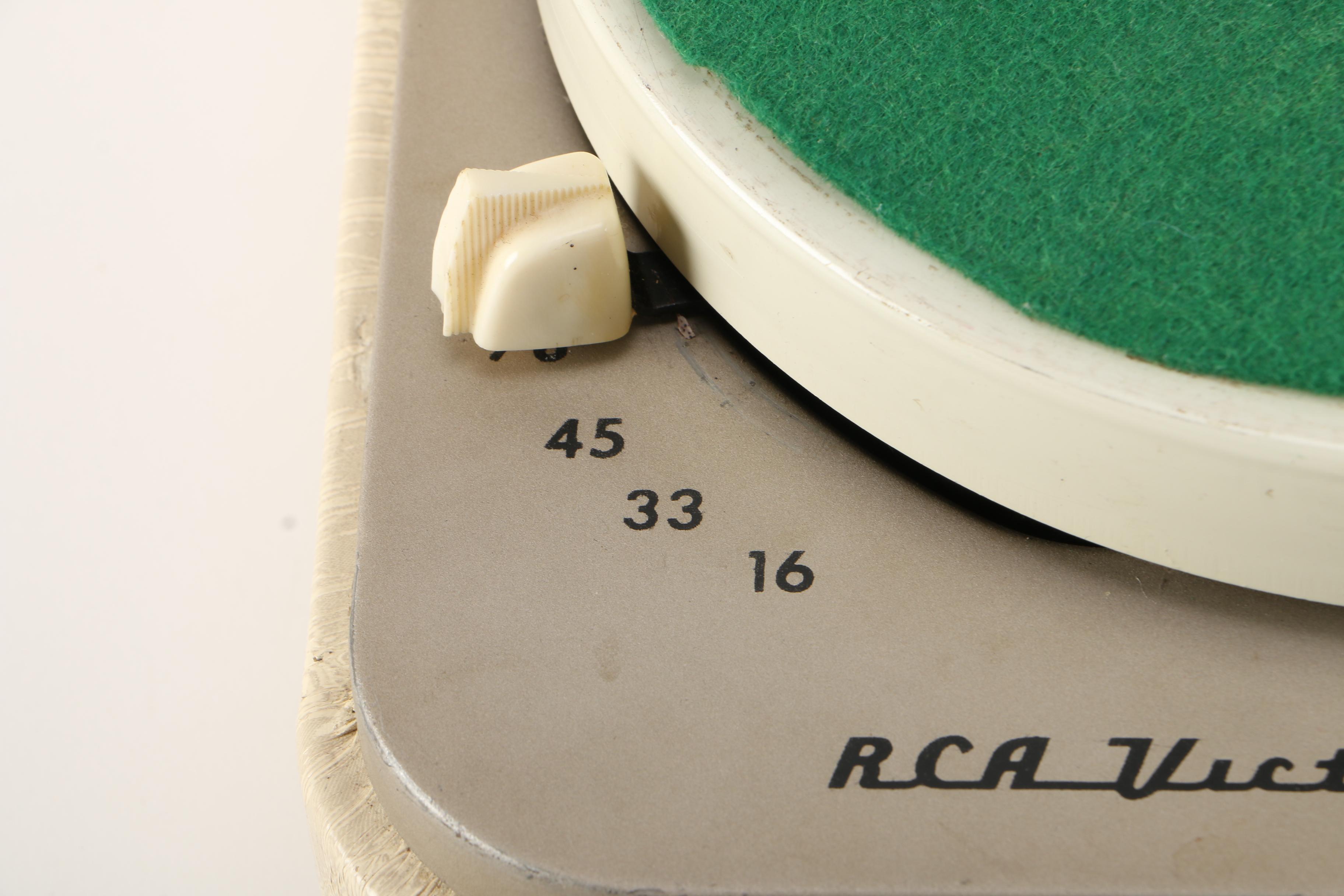 RCA Victor Portable Record Player and 45 rpm Singles