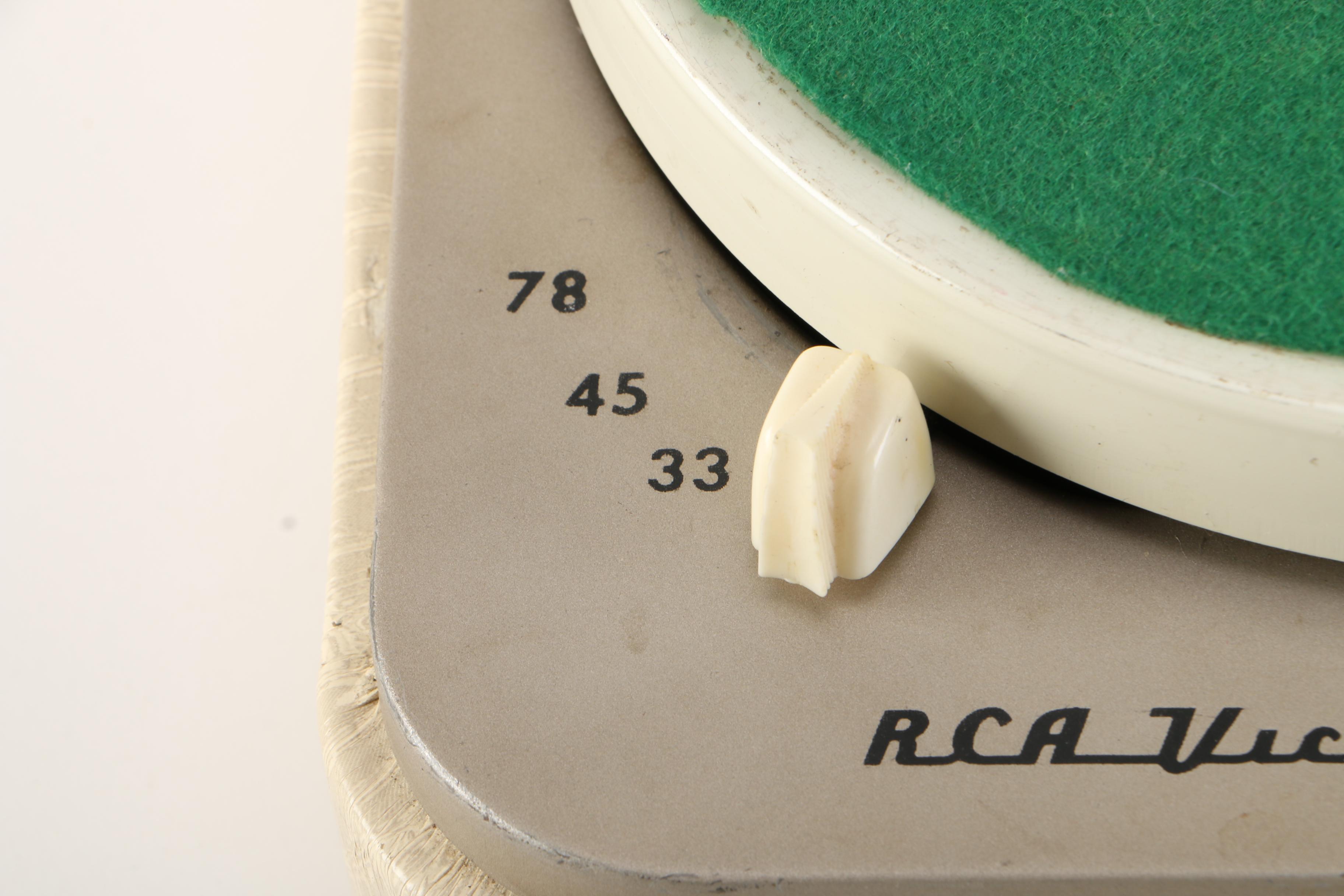 RCA Victor Portable Record Player and 45 rpm Singles