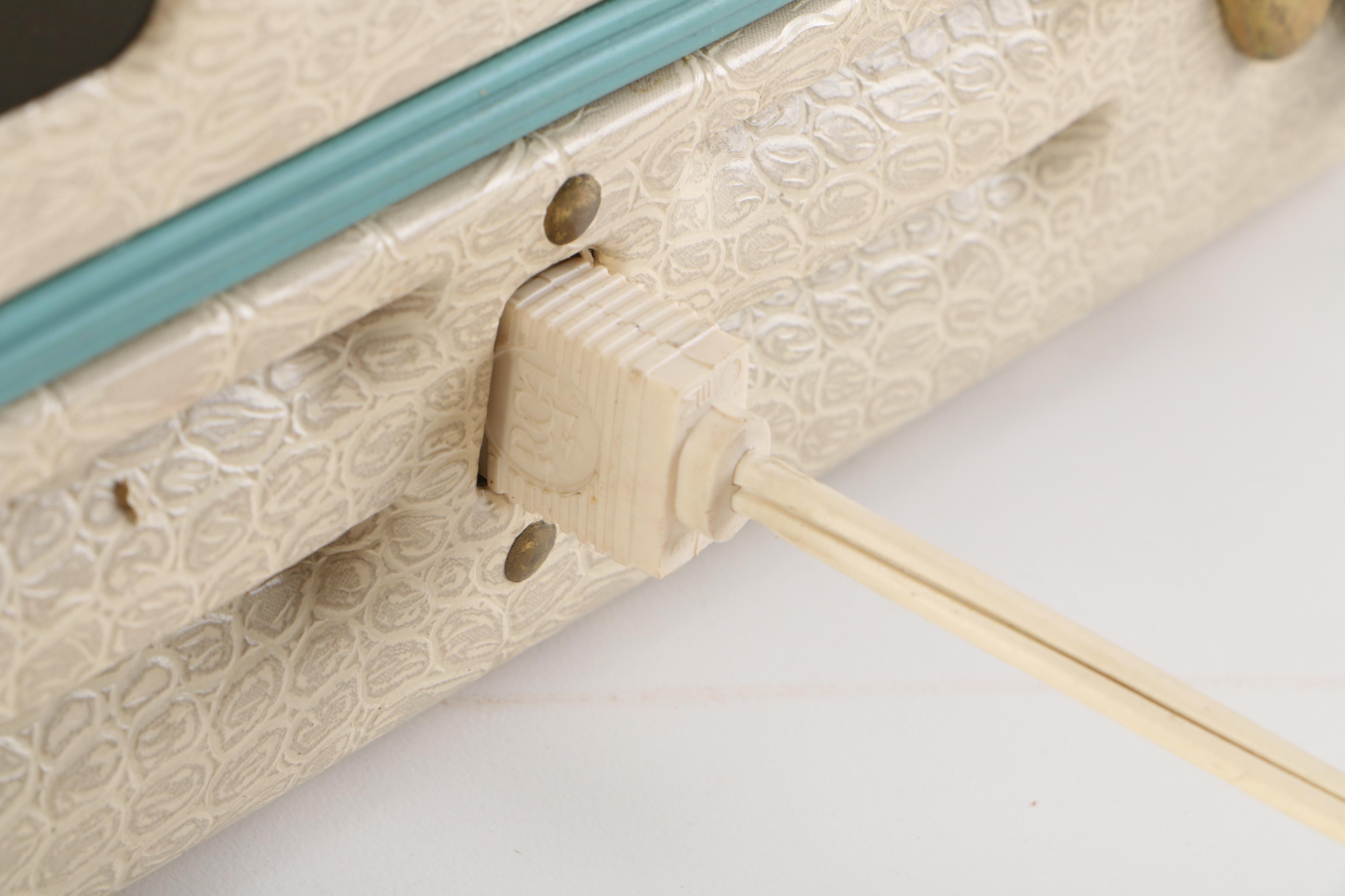 RCA Victor Portable Record Player and 45 rpm Singles