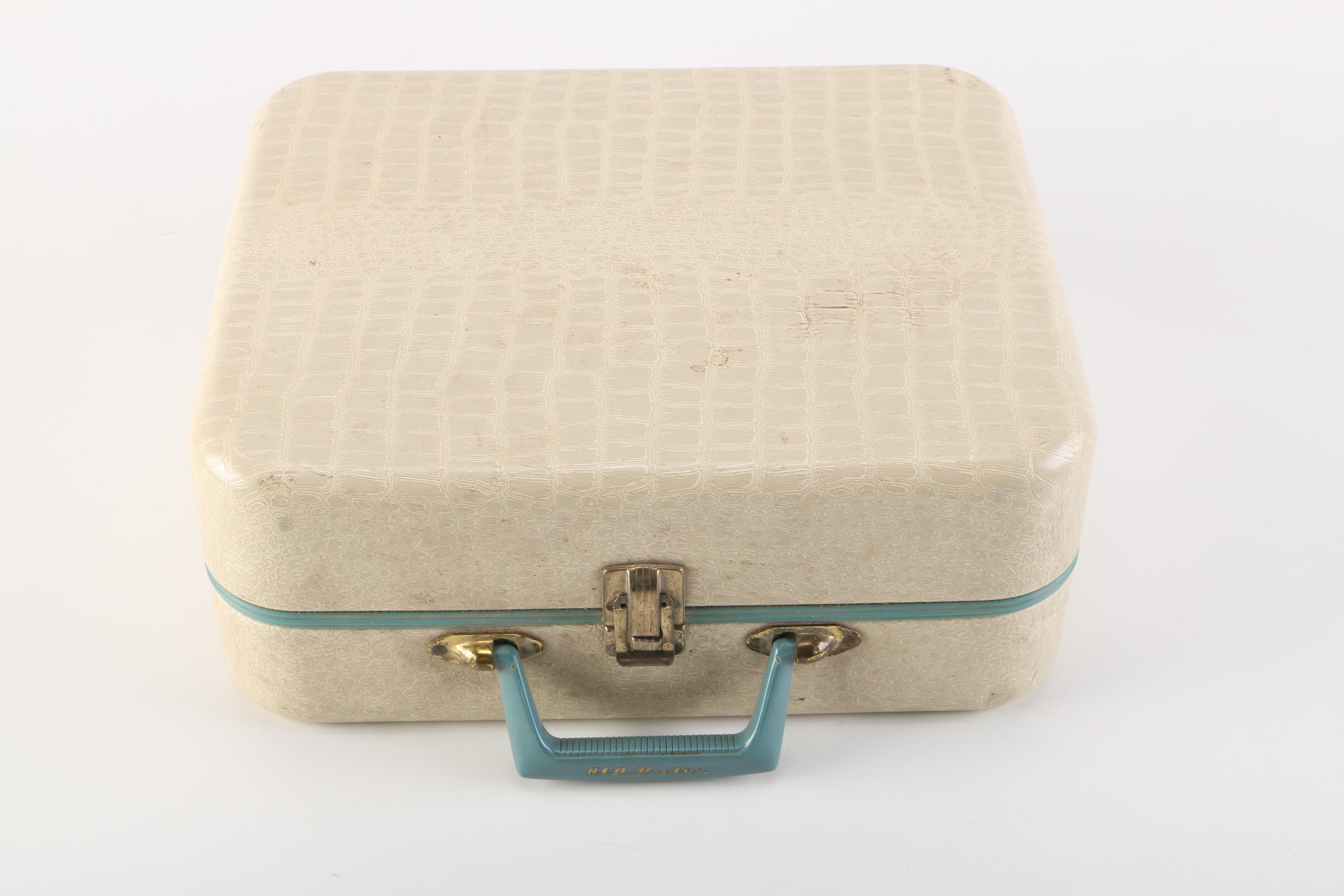 RCA Victor Portable Record Player and 45 rpm Singles