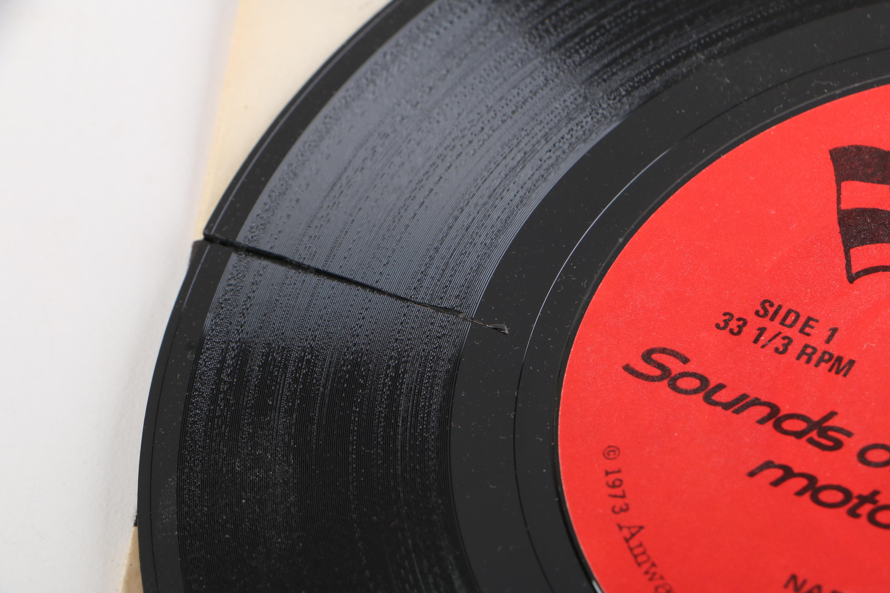 RCA Victor Portable Record Player and 45 rpm Singles