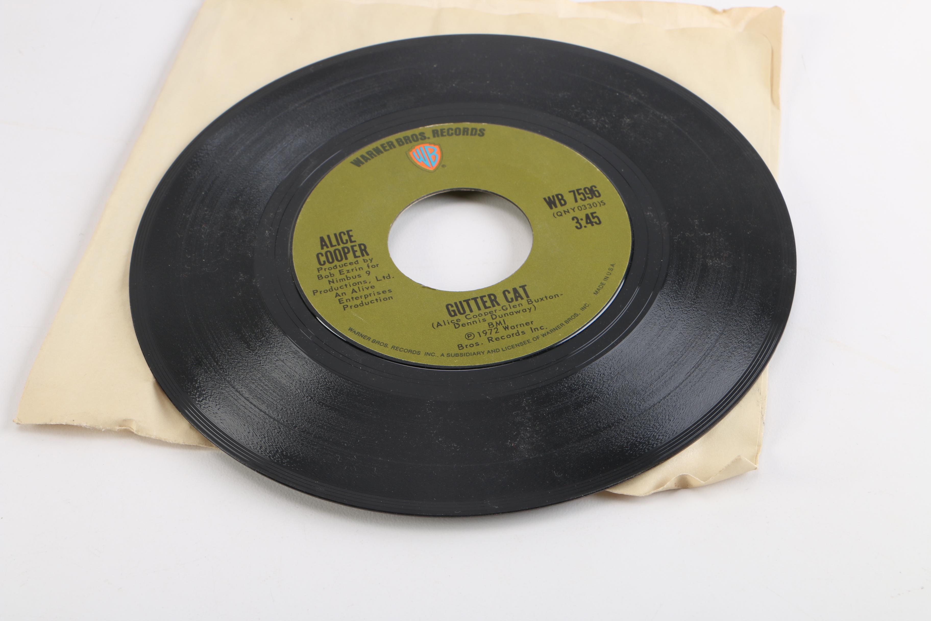 RCA Victor Portable Record Player and 45 rpm Singles