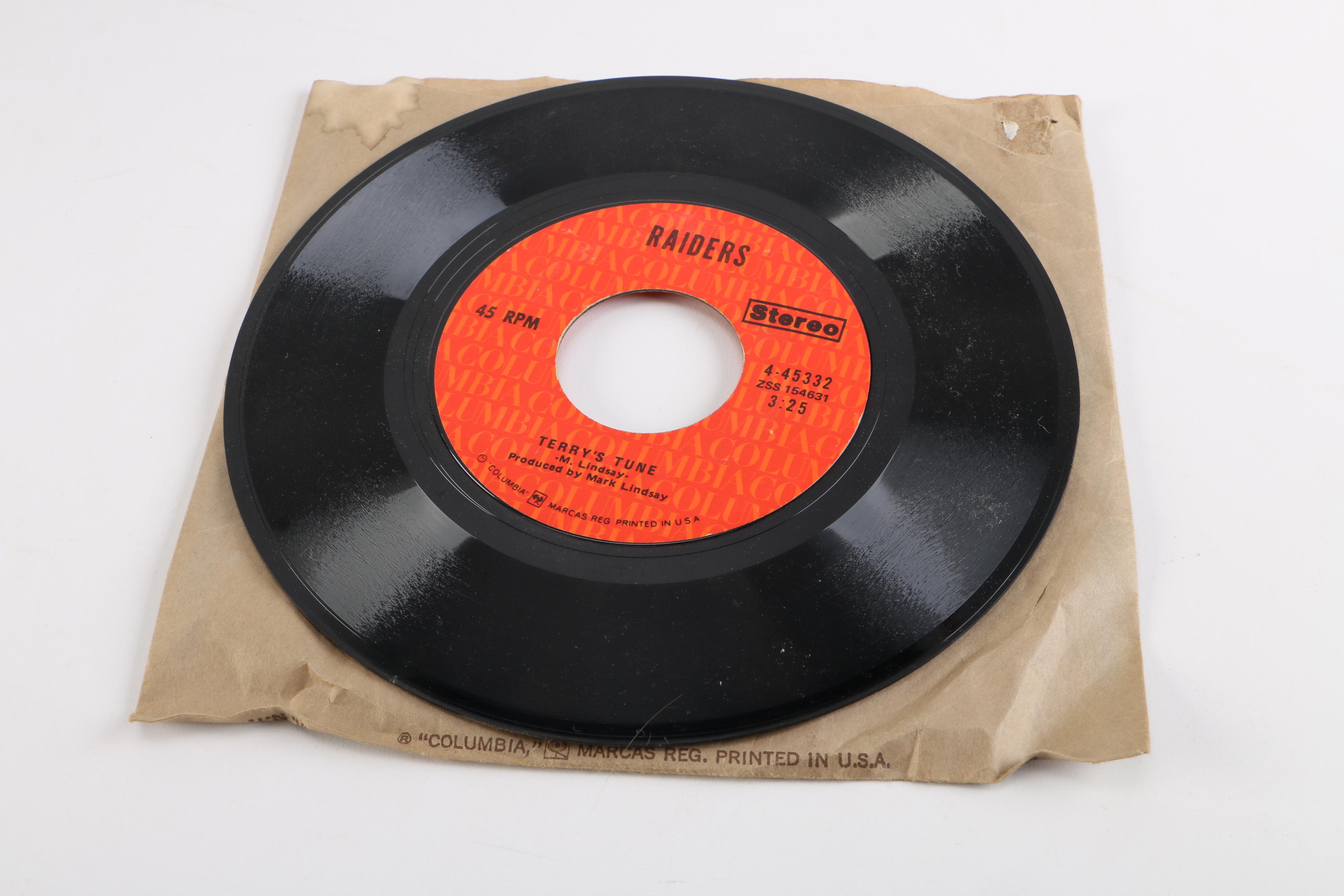 RCA Victor Portable Record Player and 45 rpm Singles