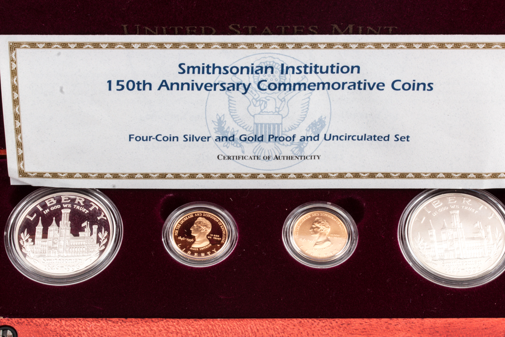 Set of Four Smithsonian Institution 150th Anniversary Gold and Silver Coins